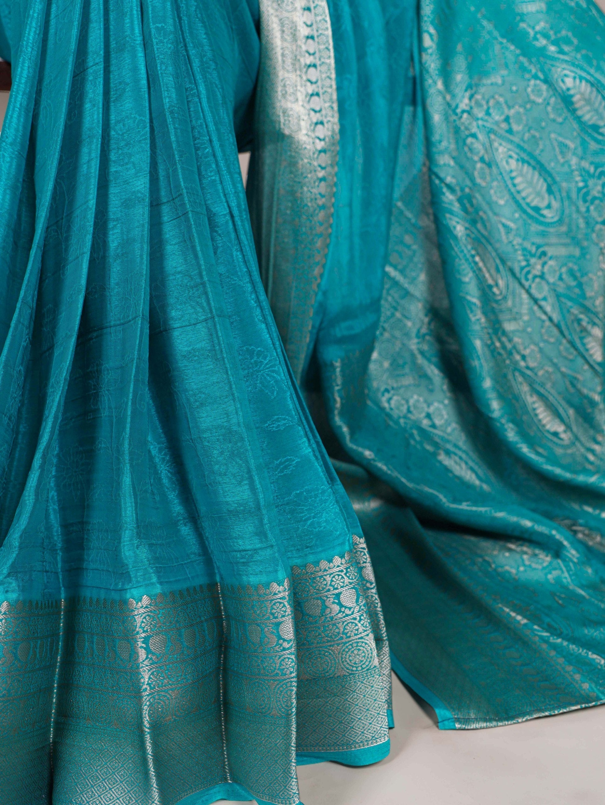Firozi Elegant Chinon Saree with Self Print & Zari Weaving Work Unstitched Blouse Included