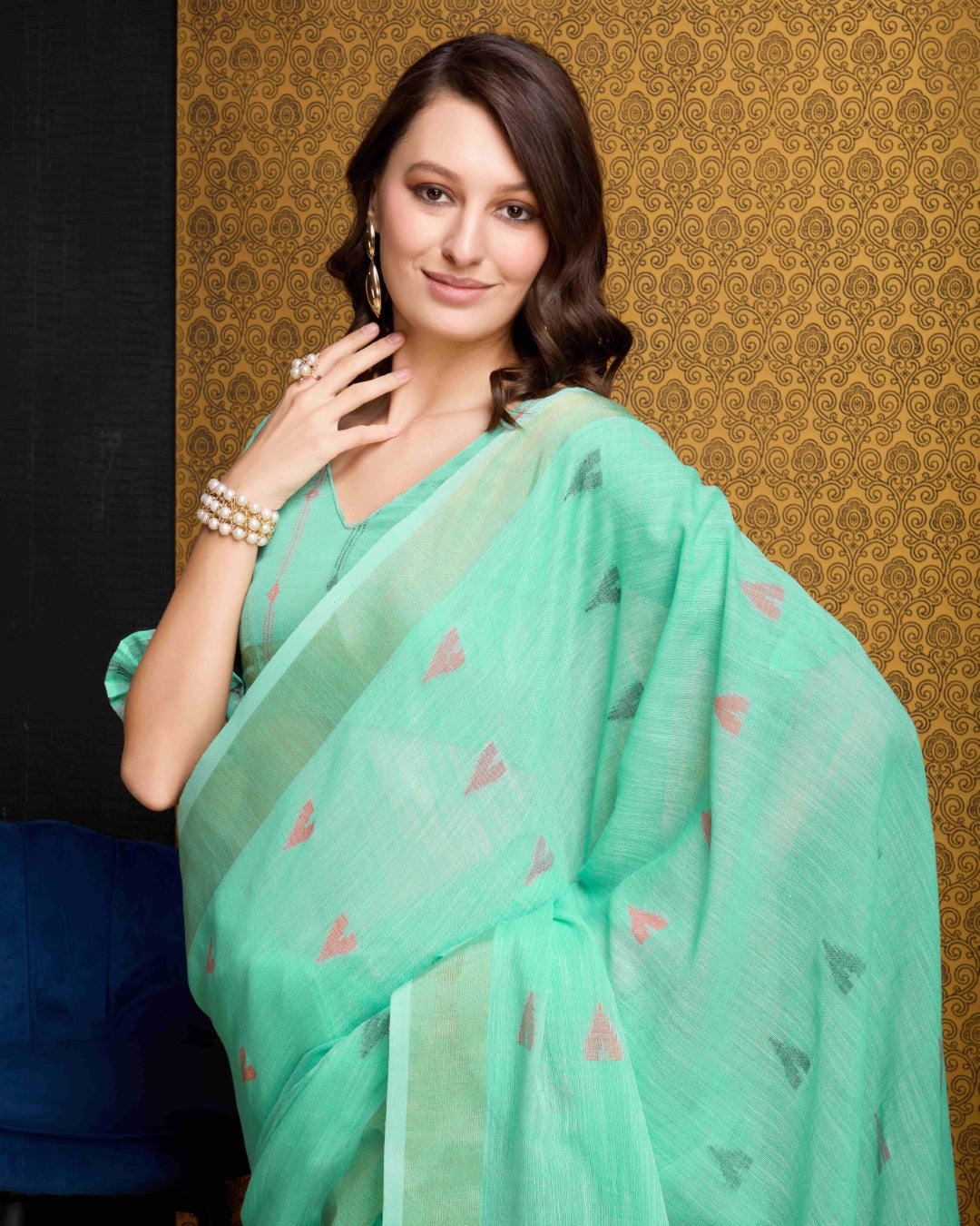 Firozi Elegant & Gold-Toned Ikat Woven Saree with Zari Border