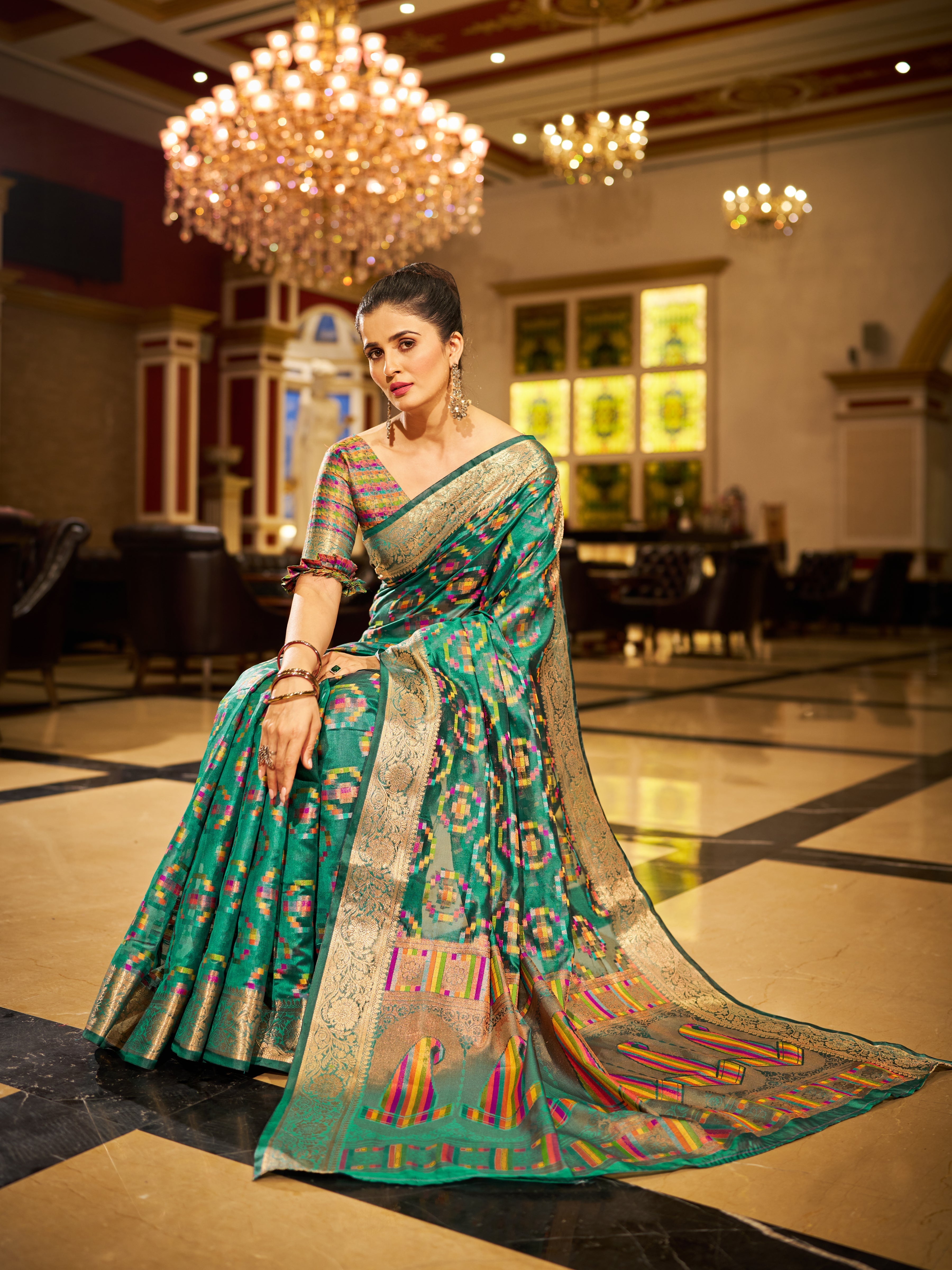 Firozi Regal Kanjeevaram Organza Saree with Zari Woven Border