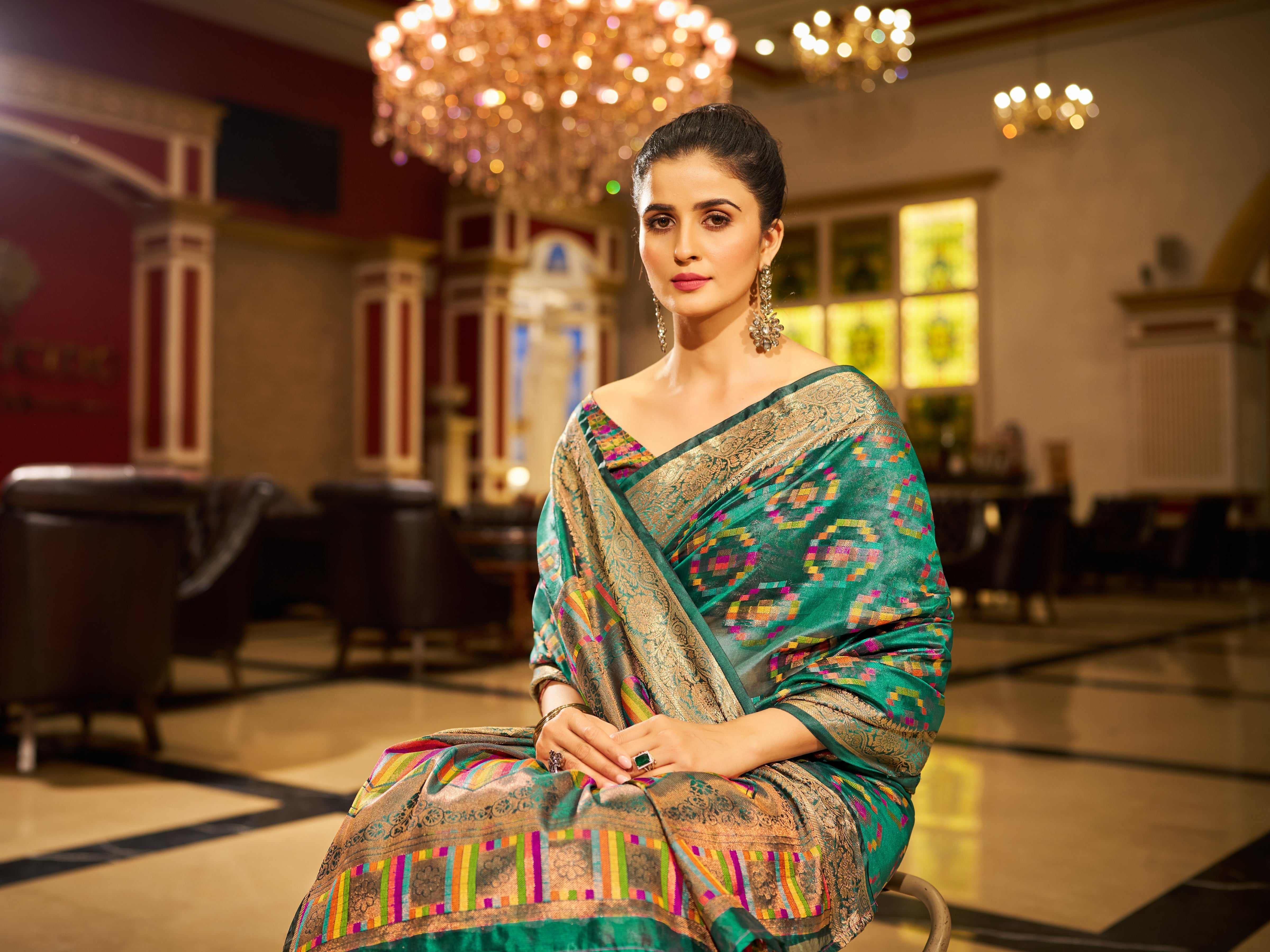 Firozi Regal Kanjeevaram Organza Saree with Zari Woven Border