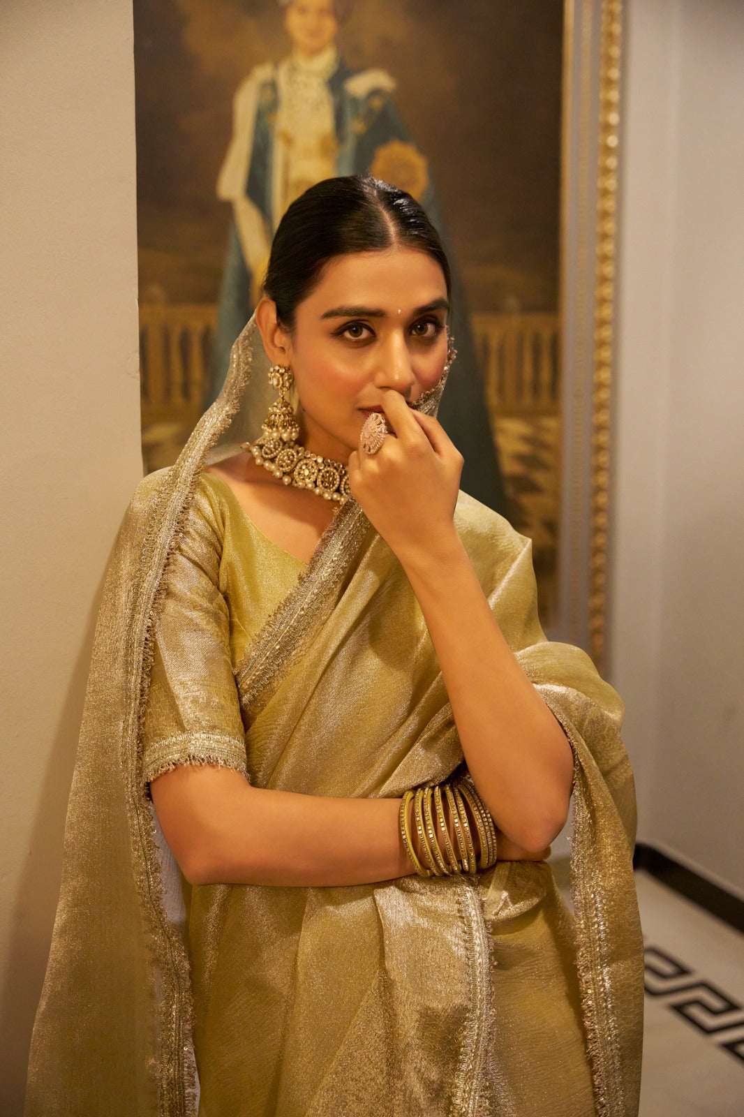 Gold Elegant Tissue Shimmer Saree with Zari Weaving and Sequins Lace Border