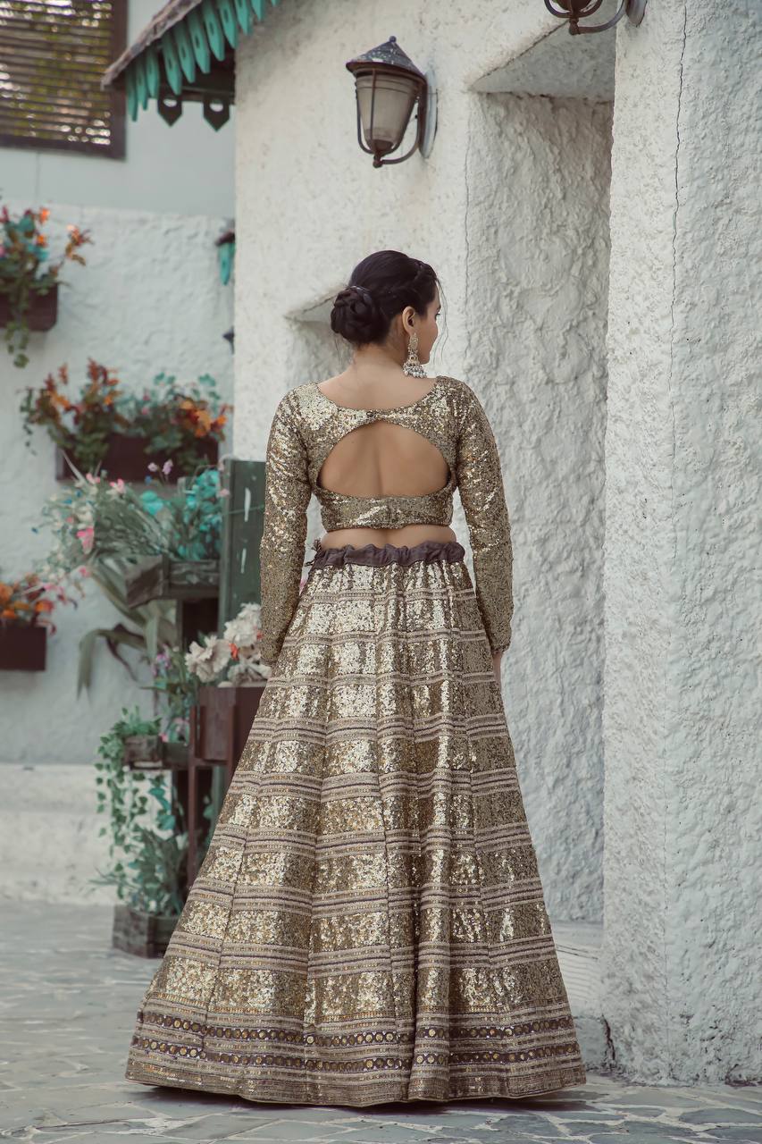 Gold Shimmering Faux Georgette Sequins Lehenga Set with Can-Can