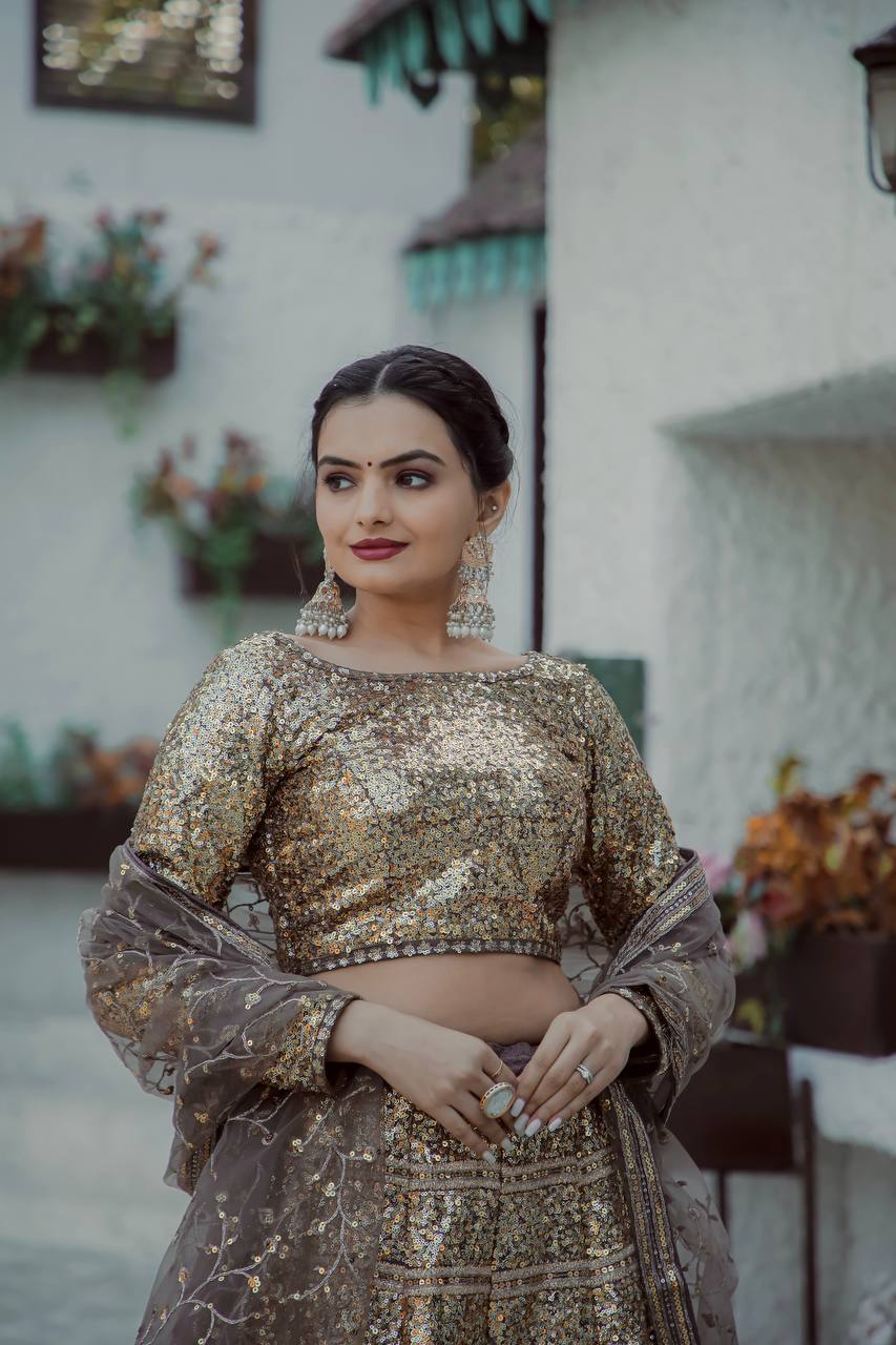 Gold Shimmering Faux Georgette Sequins Lehenga Set with Can-Can