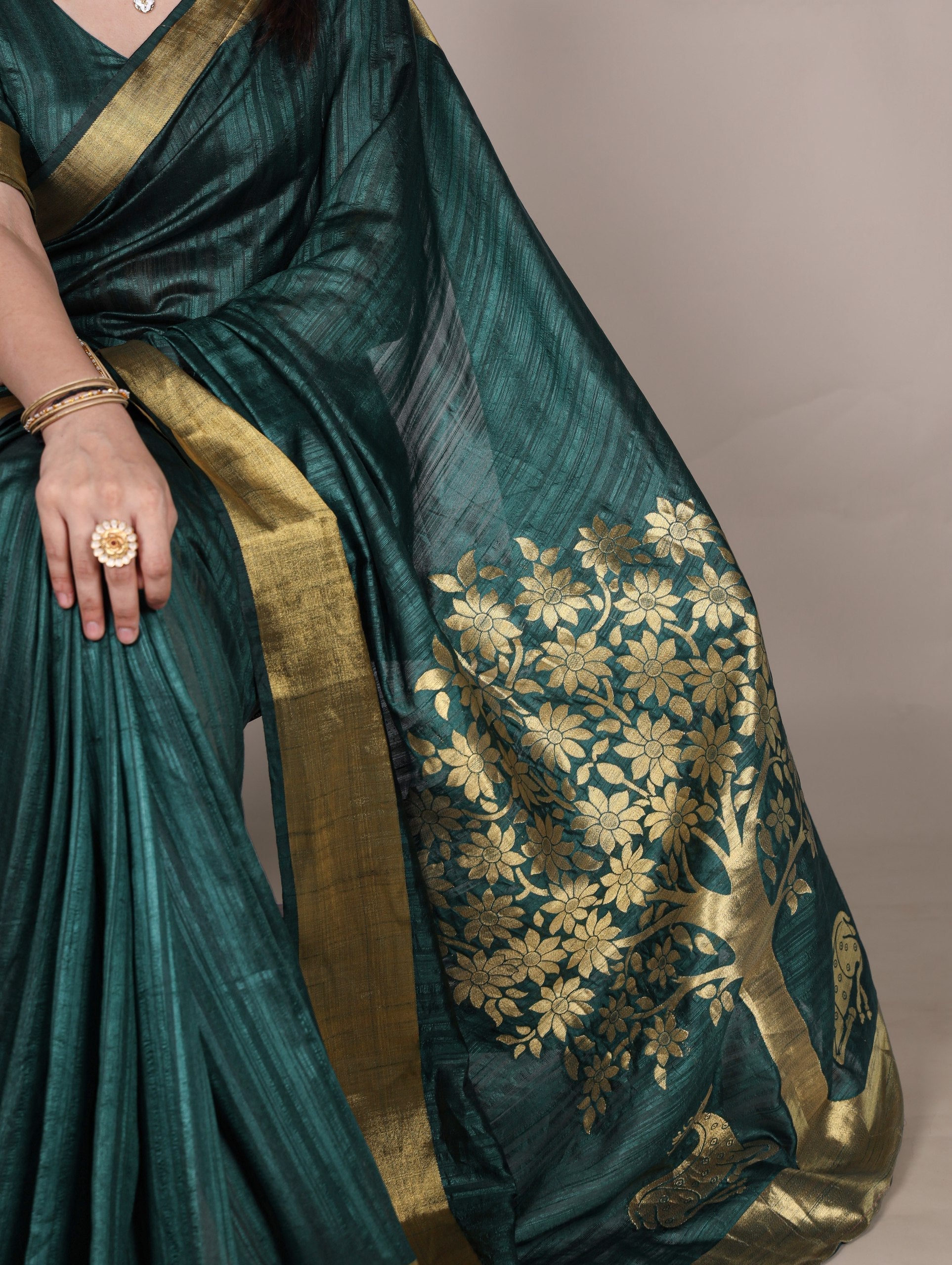 Green Elegant Raw Silk Saree with Zari Weaving Work