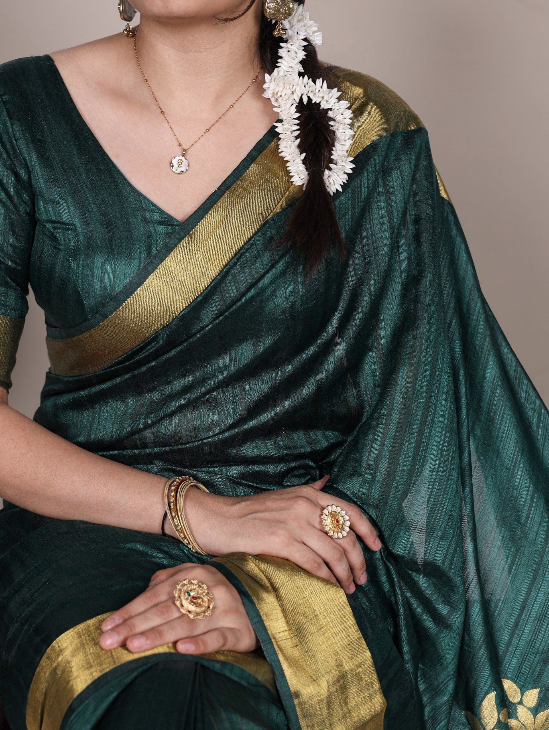 Green Elegant Raw Silk Saree with Zari Weaving Work