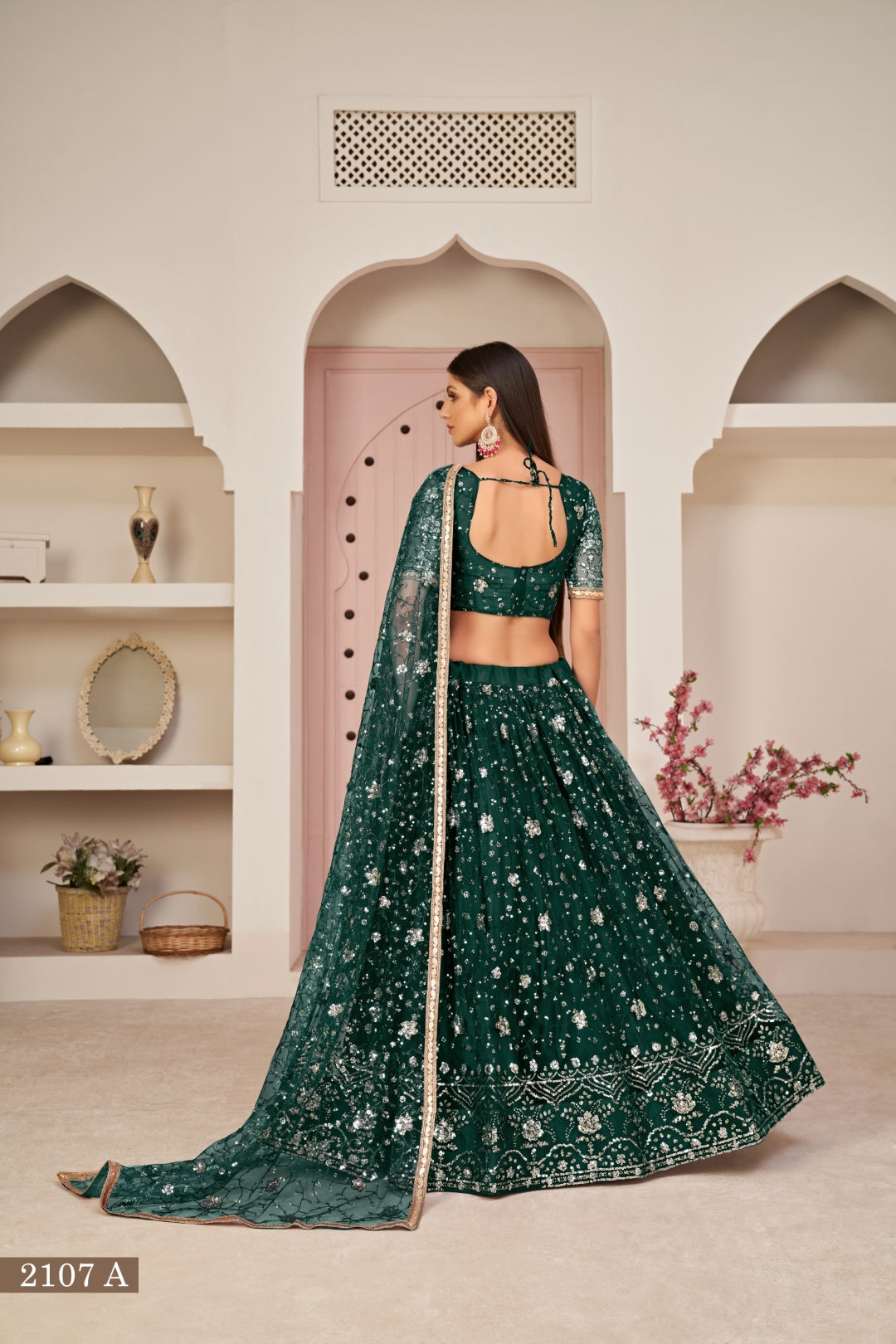 Green Luxurious Butterfly Net Lehenga with All-Over Embroidery