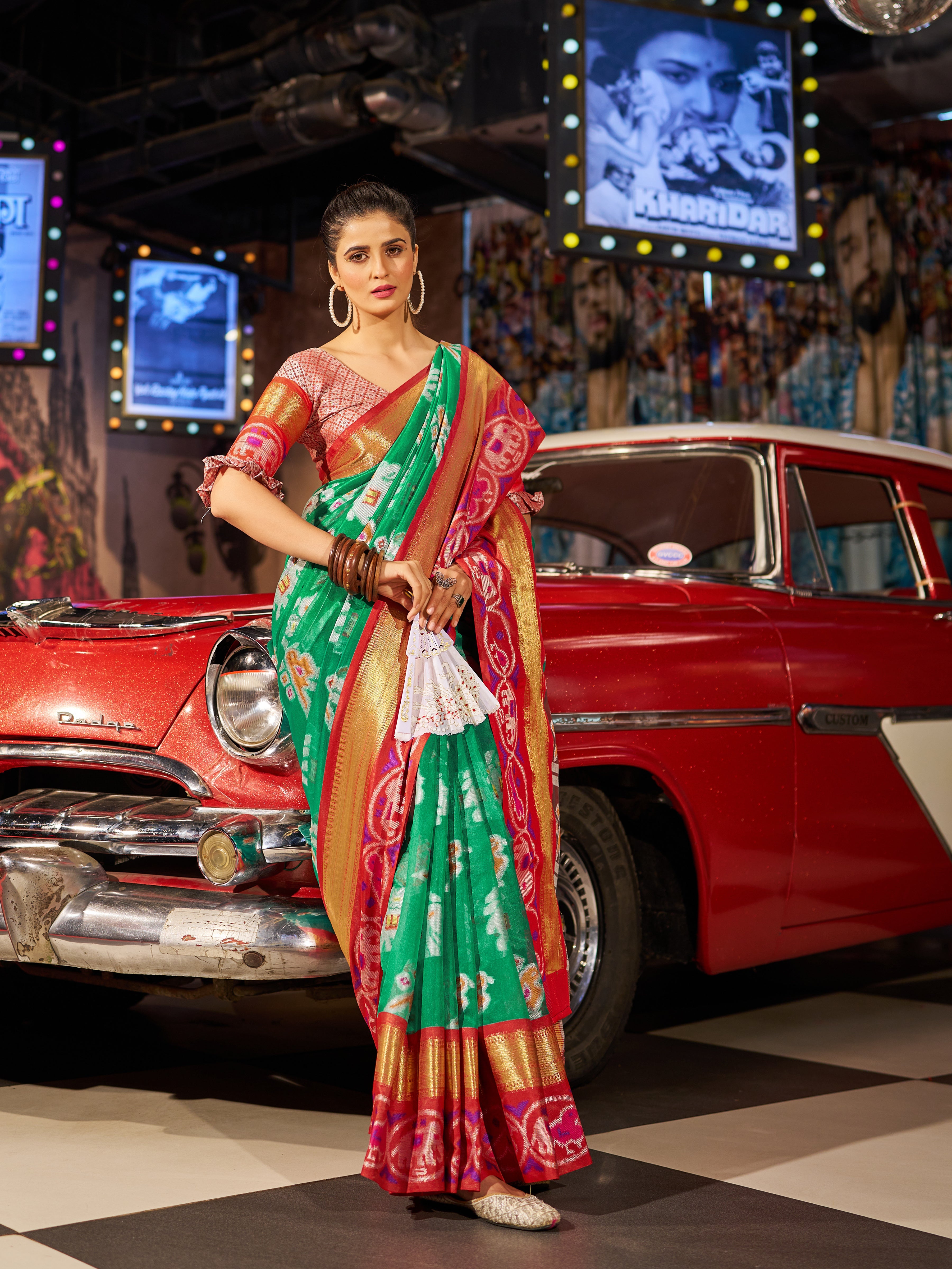 Enchanting Green Patola Silk Saree with Exquisite Weaving Work