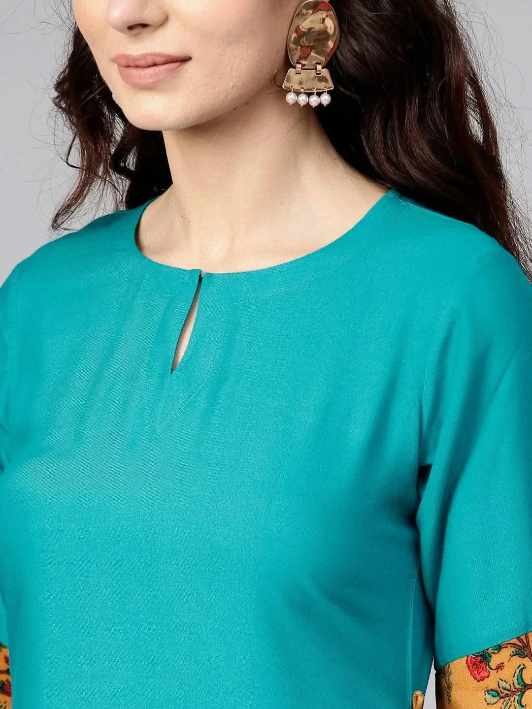 Anouk Green Solid Rayon A-Line Kurta With Palazzos
