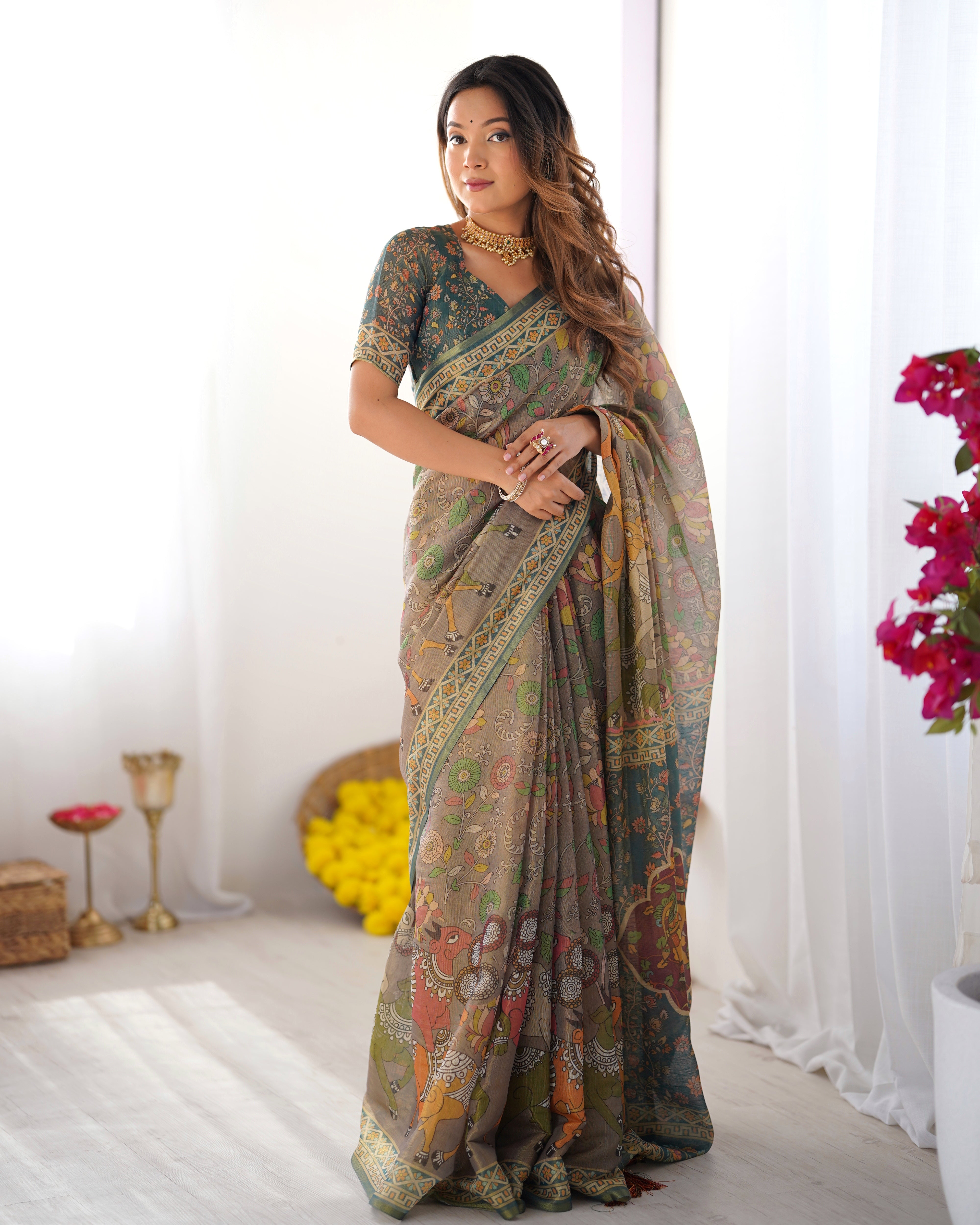 Teal Green Handloom Cotton Saree with Floral Print and Royal Elephant Pallu