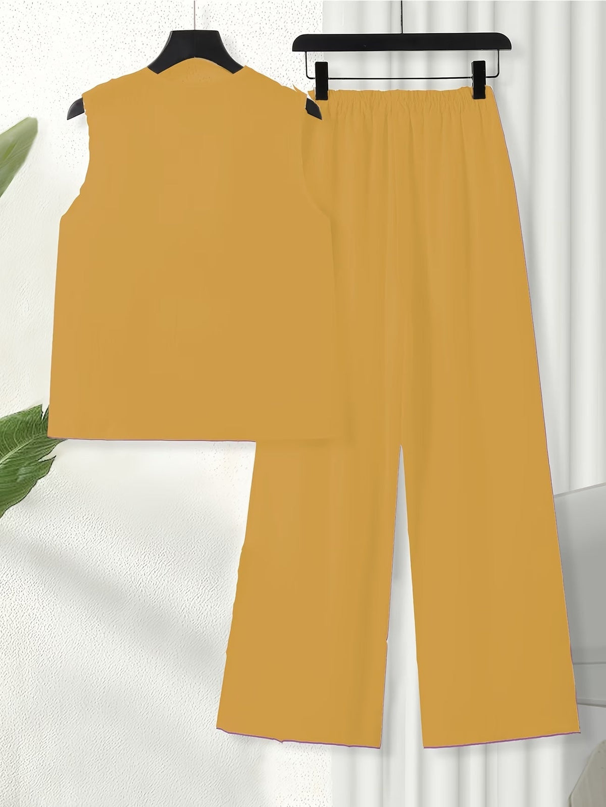 Chic Polka Dot Two-Piece Set – Stylish Top & Printed Pants Outfit for Women