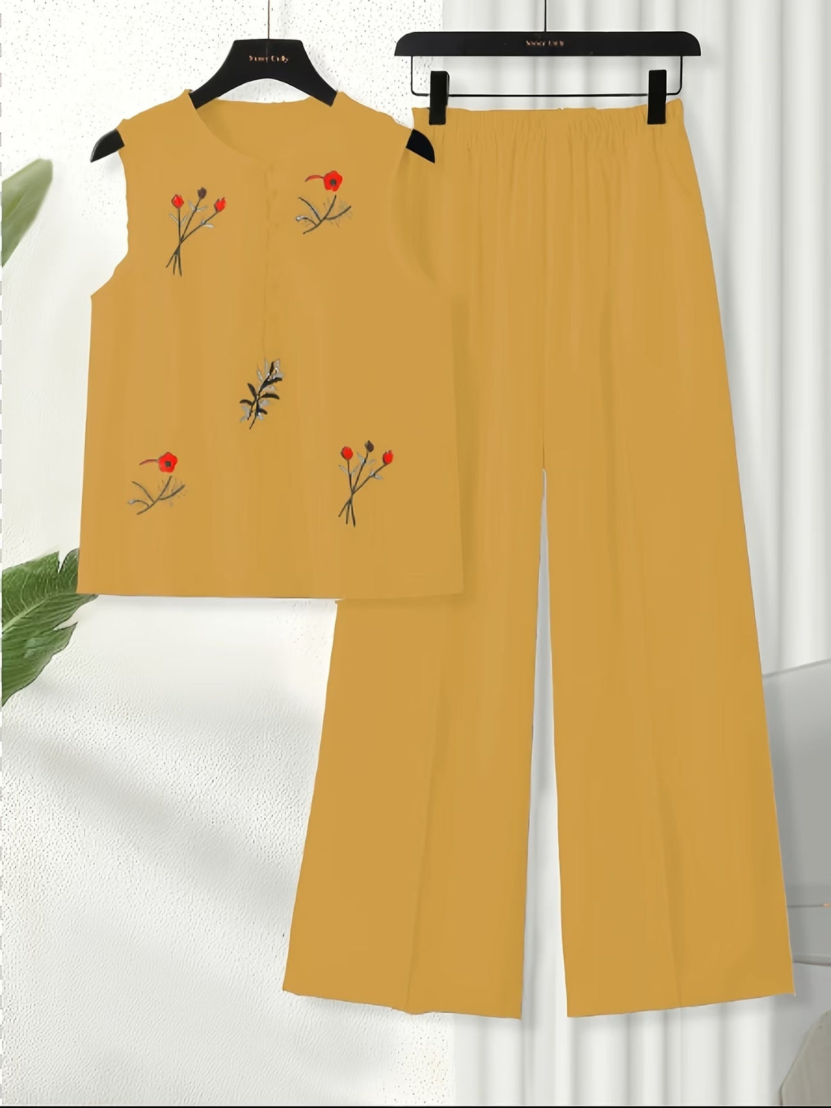 Chic Polka Dot Two-Piece Set – Stylish Top & Printed Pants Outfit for Women