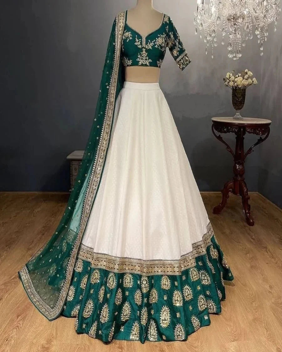 White Elegant Tapeta Silk Lehenga with Pearl & Embroidery Work