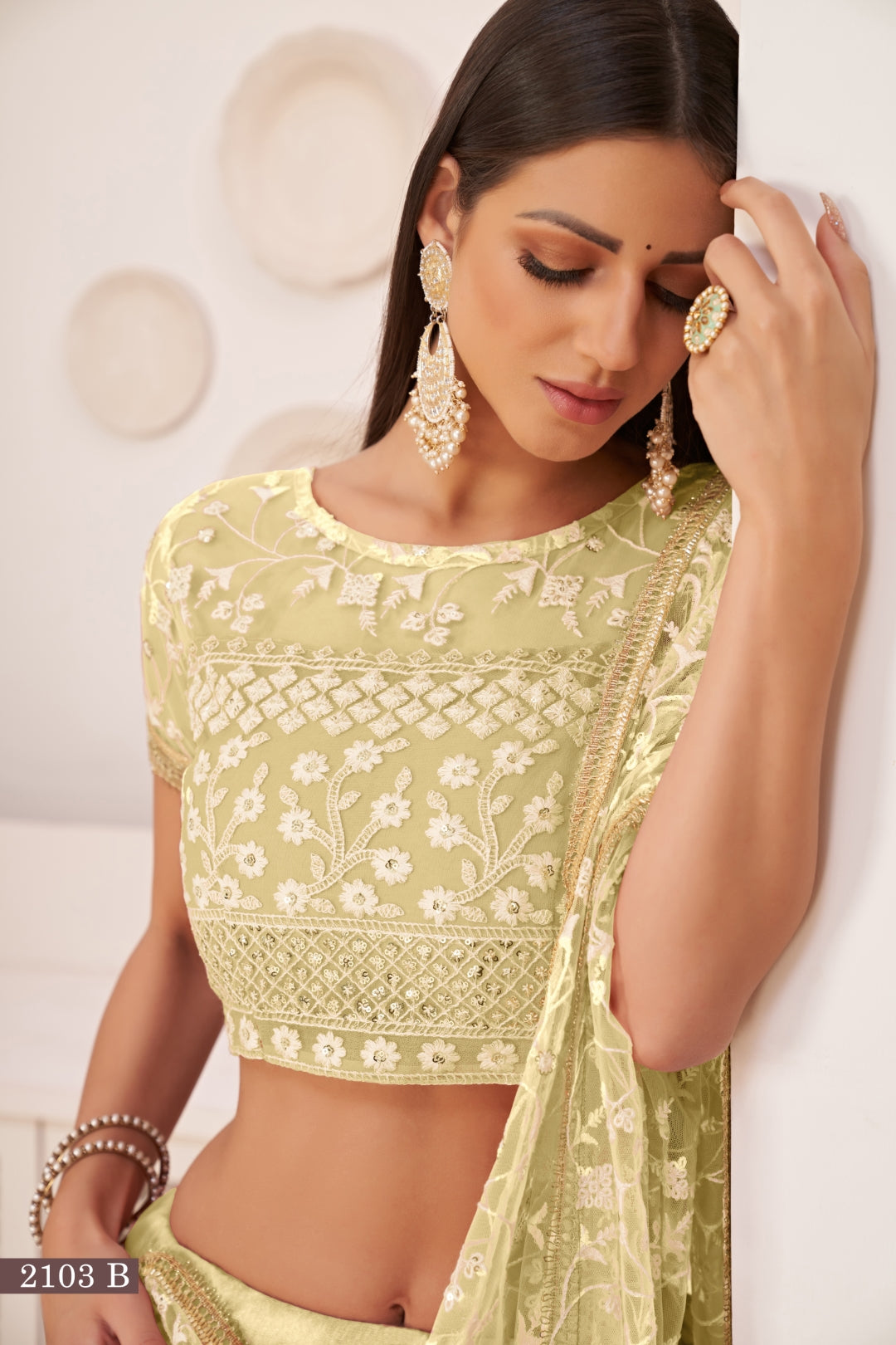 Lemon Yellow Elegant Butterfly Net Lehenga with Intricate Embroidery
