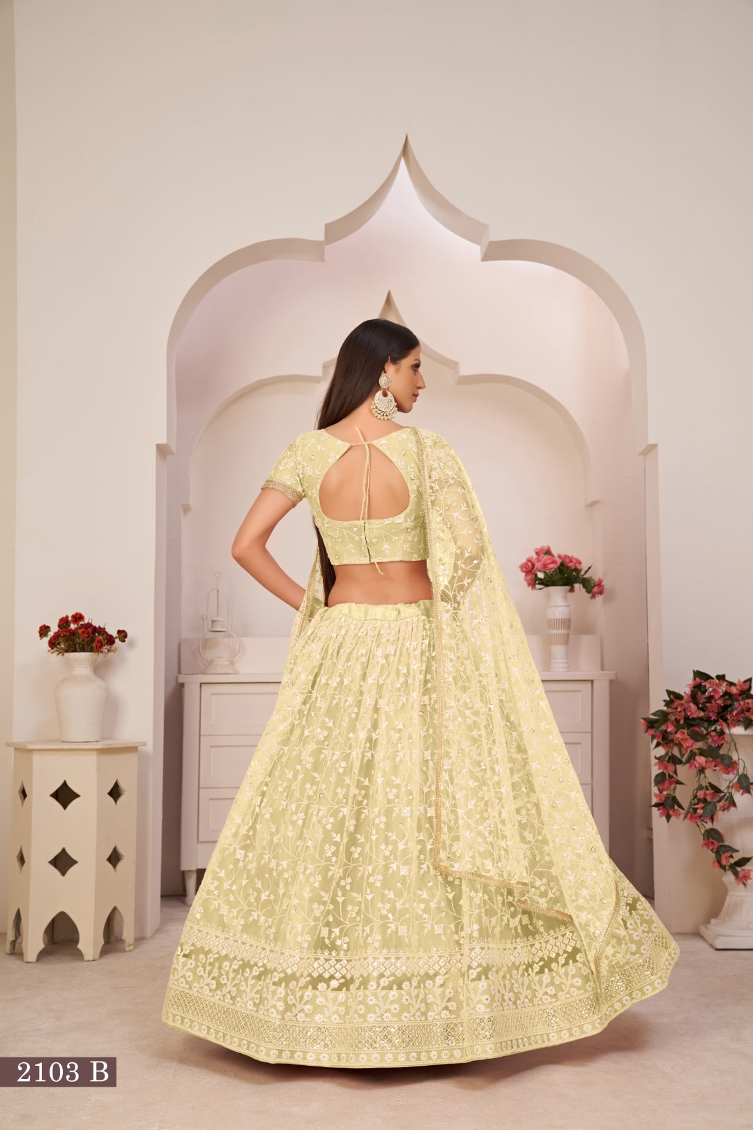 Lemon Yellow Elegant Butterfly Net Lehenga with Intricate Embroidery