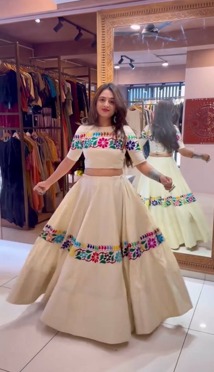 Off White Exquisite Pure Kora Cotton Navratri Lehenga Choli with Gamthi & Mirror Handwork