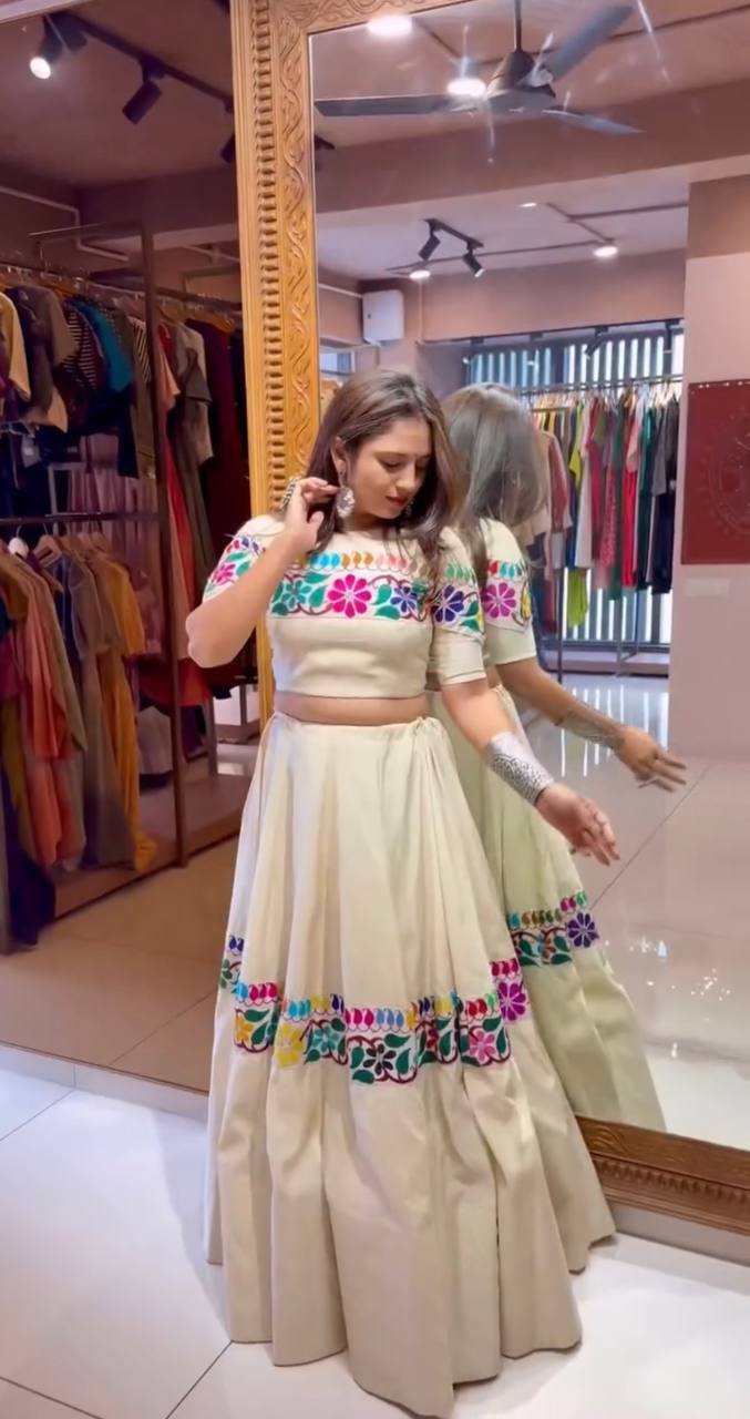 Off White Exquisite Pure Kora Cotton Navratri Lehenga Choli with Gamthi & Mirror Handwork