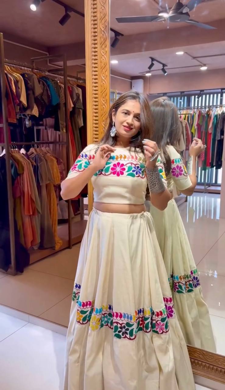 Off White Exquisite Pure Kora Cotton Navratri Lehenga Choli with Gamthi & Mirror Handwork