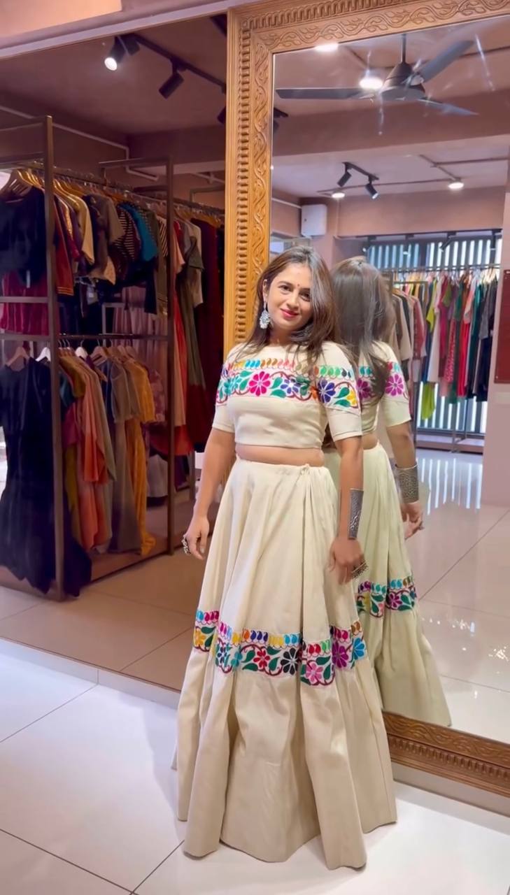 Off White Exquisite Pure Kora Cotton Navratri Lehenga Choli with Gamthi & Mirror Handwork