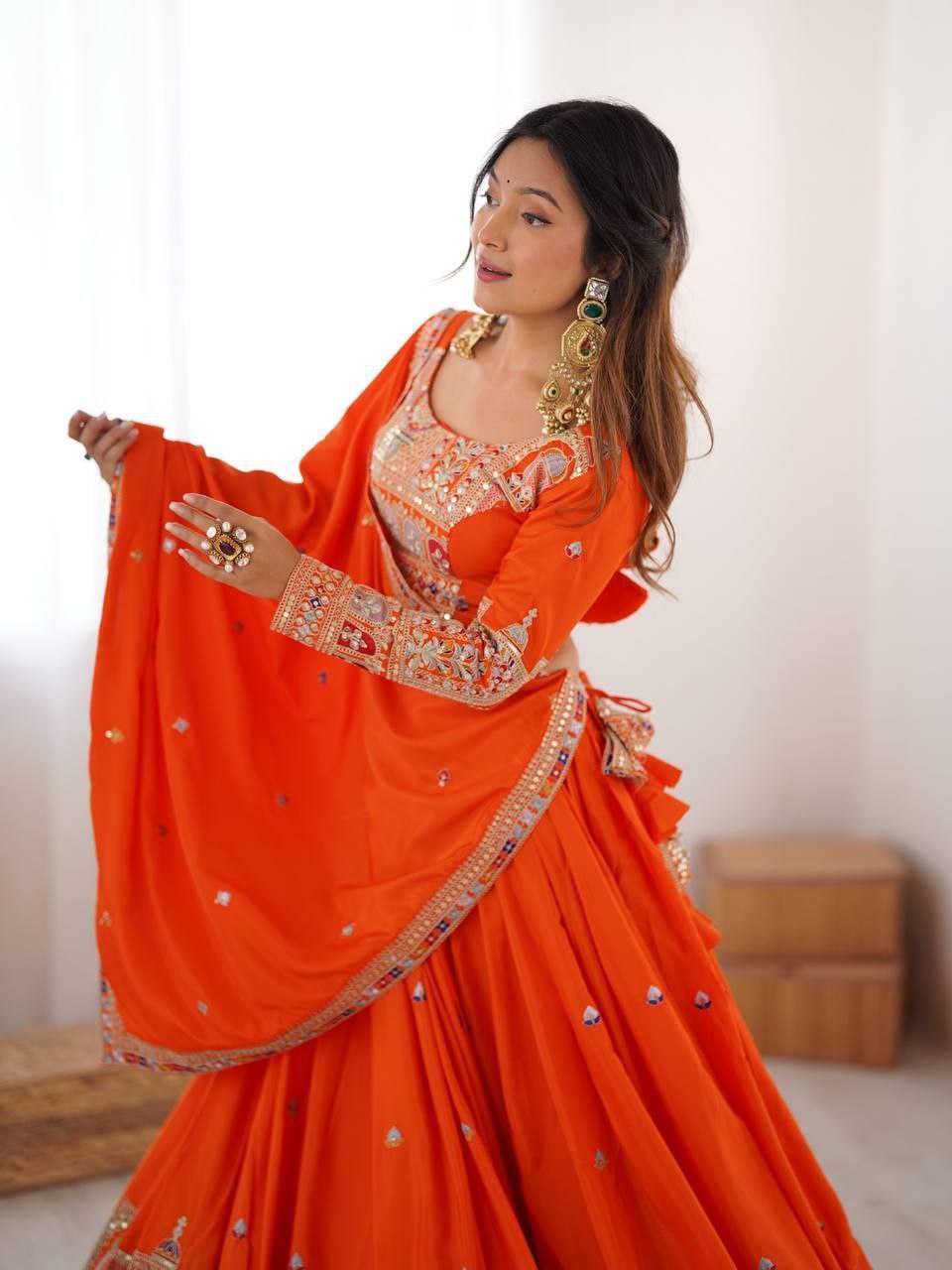 Orange Elegant French Crepe Multi-Thread & Sequin Embroidered Semi-Stitched Lehenga Choli with Matching Orange Dupatta