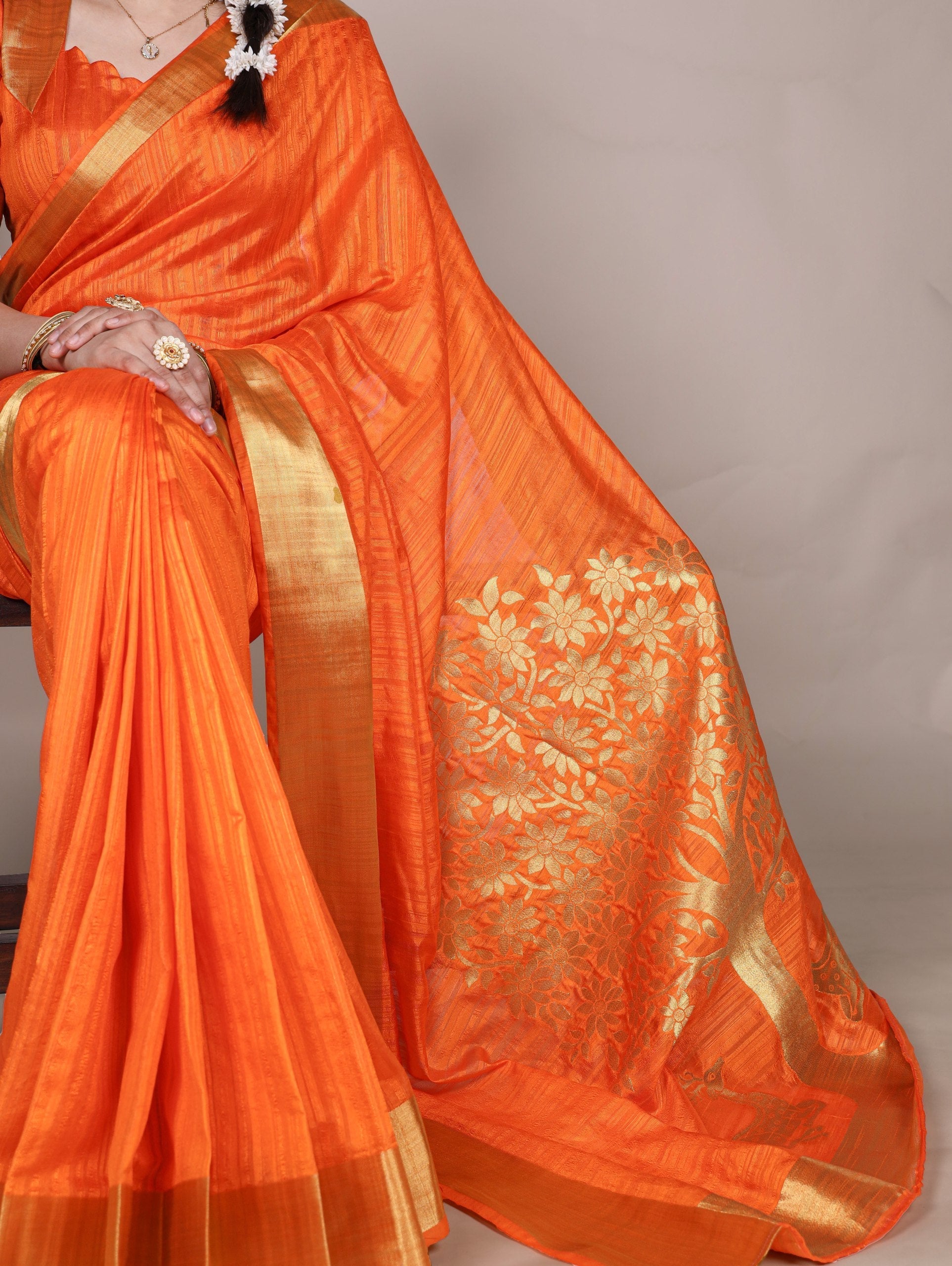 Orange Elegant Raw Silk Saree with Zari Weaving Work