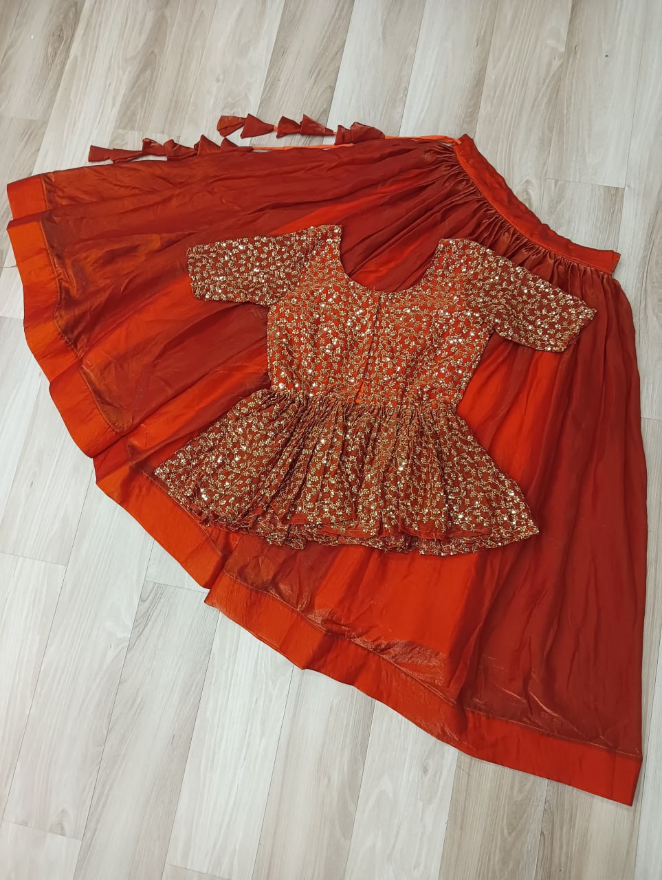 Orange Fendy Fabric Full-Stitched Lehenga Set with Sequins Embroidered Peplum Blouse