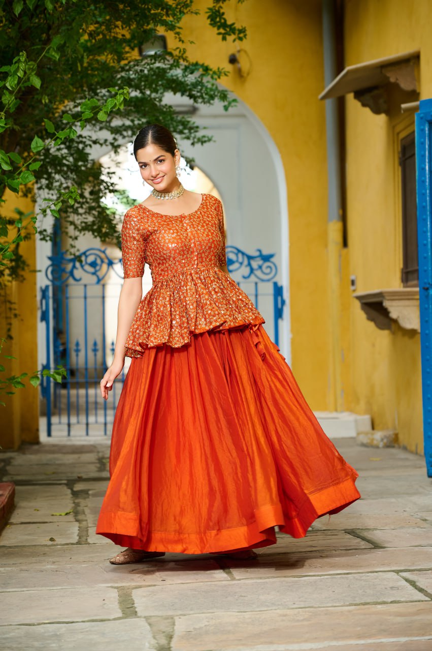 Orange Fendy Fabric Full-Stitched Lehenga Set with Sequins Embroidered Peplum Blouse
