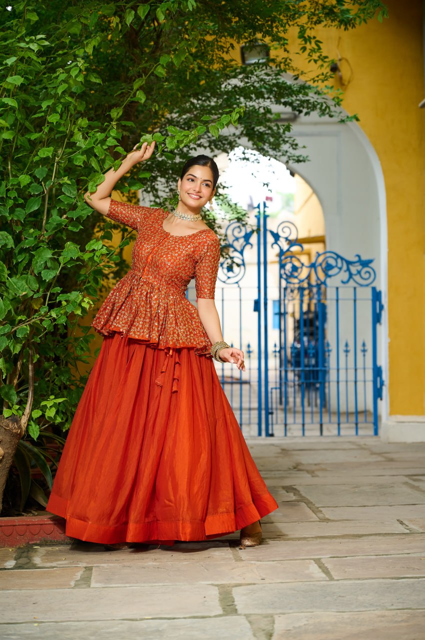 Orange Fendy Fabric Full-Stitched Lehenga Set with Sequins Embroidered Peplum Blouse