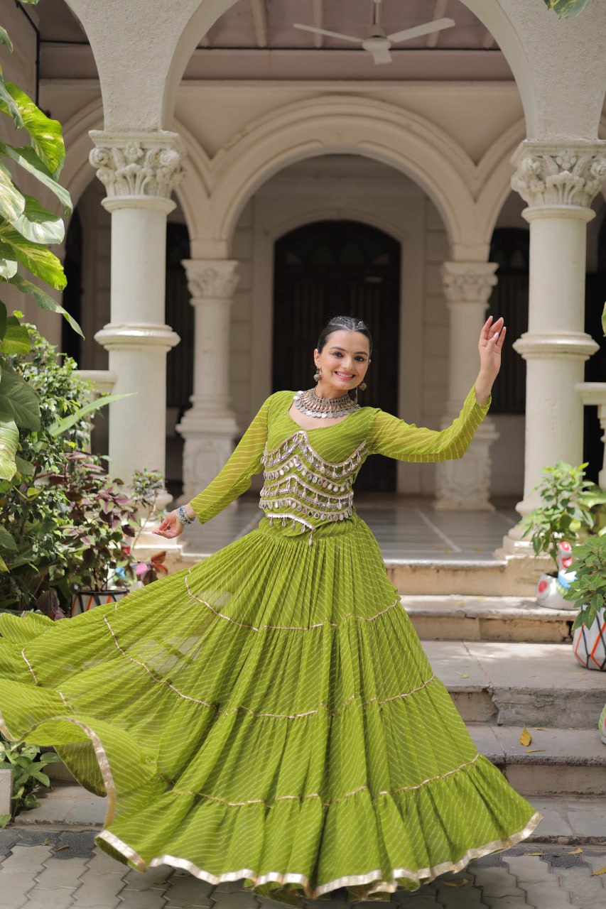 Parrot Green Navratri Special Leheriya Print Lehenga Choli with 12 Mtr Flair & Mirror Lace Work