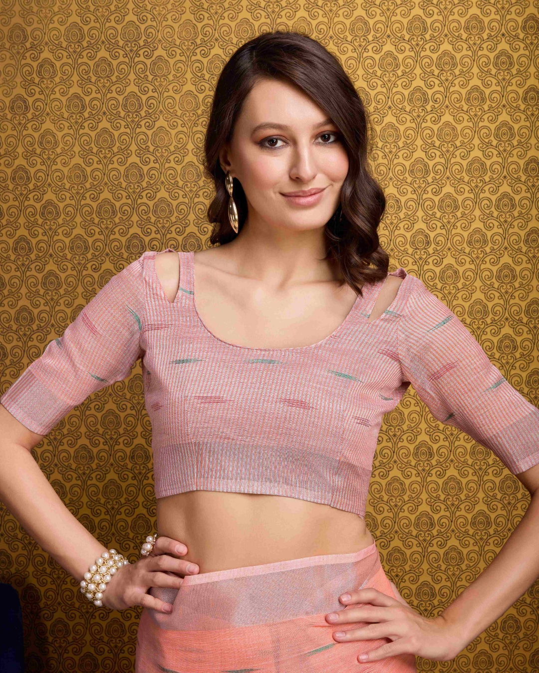 Peach Elegant & Gold-Toned Ikat Woven Saree with Zari Border