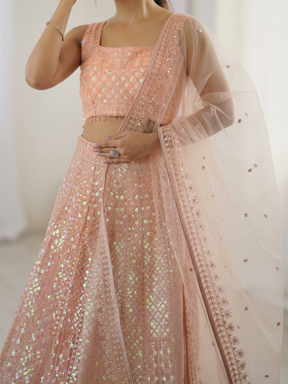 Peach Rainbow Sequins & Dori Embroidered Net Lehenga Set with Tassel Border – 3.5 Meter Flair