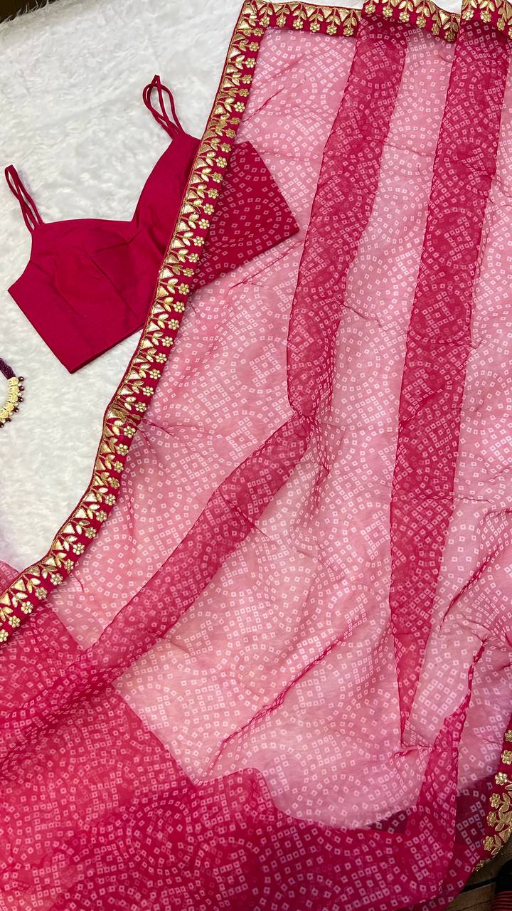Pink Bloom Bandhani Organza Saree – A Timeless Elegance