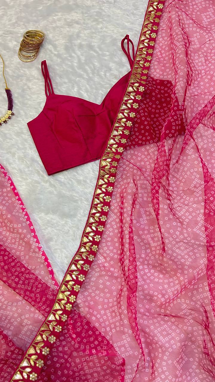 Pink Bloom Bandhani Organza Saree – A Timeless Elegance
