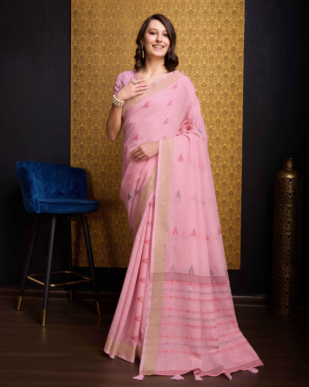 Pink Elegant & Gold-Toned Ikat Woven Saree with Zari Border