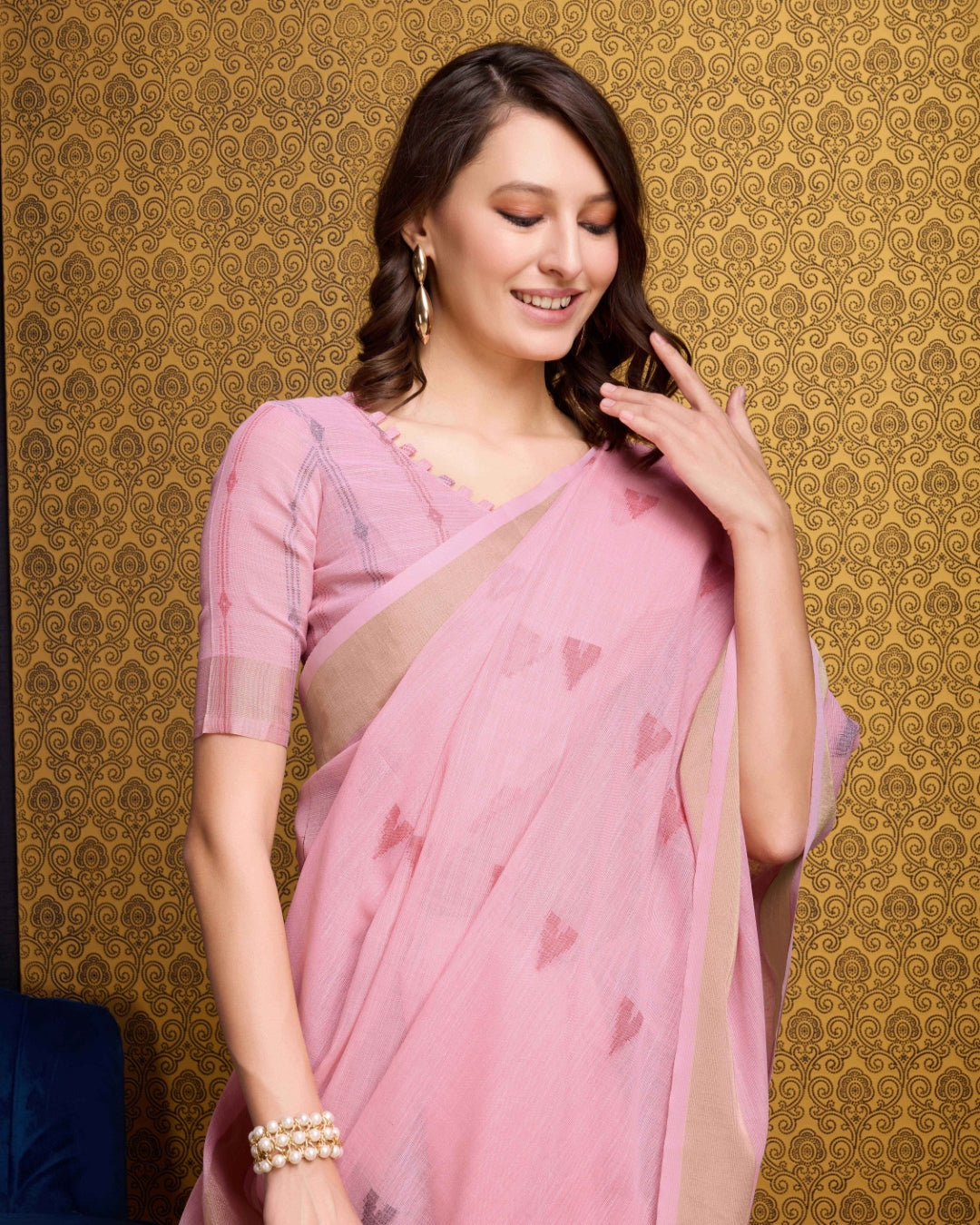Pink Elegant & Gold-Toned Ikat Woven Saree with Zari Border