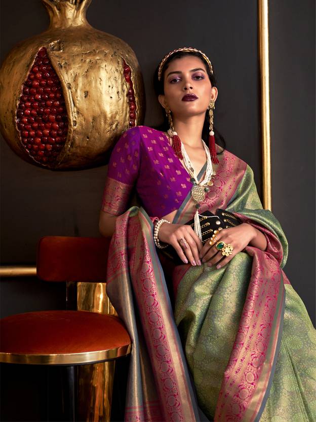Pista Elegant Banarasi Silk Blend Woven Saree with Tassel Detailing
