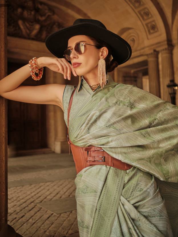Pista Elegant Banarasi Silk Blend Woven Saree with Tassel Detailing
