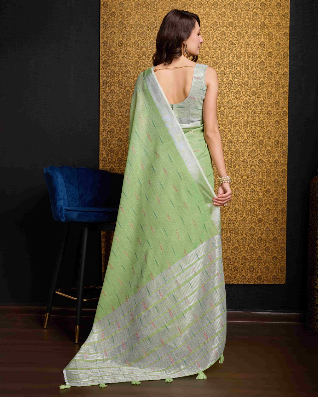 Pista Elegant & Gold-Toned Ikat Woven Saree with Zari Border