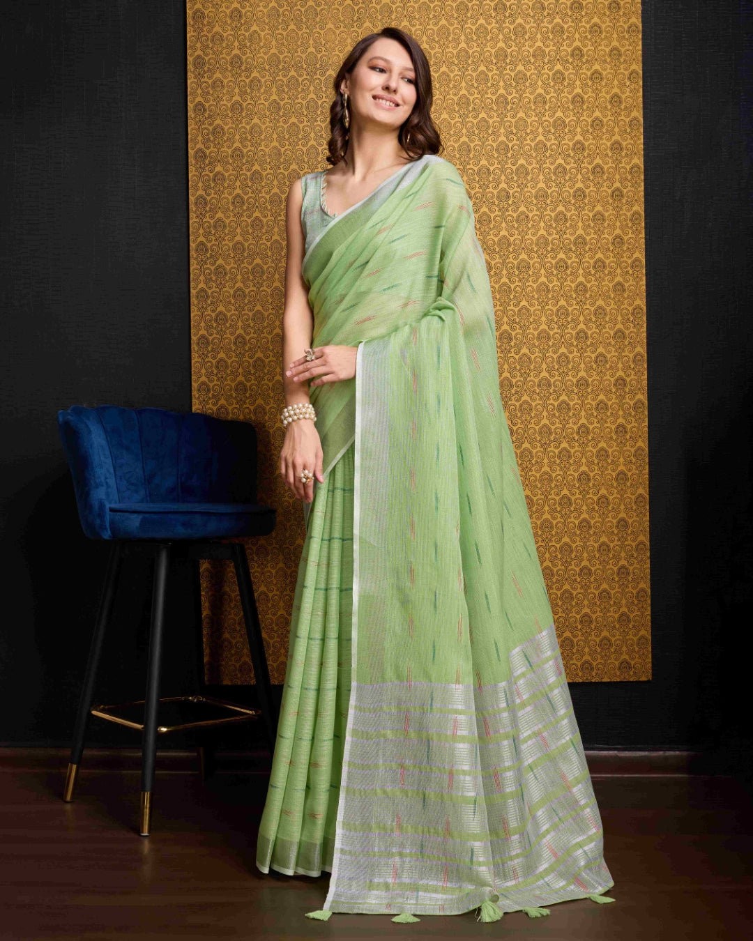 Pista Elegant & Gold-Toned Ikat Woven Saree with Zari Border