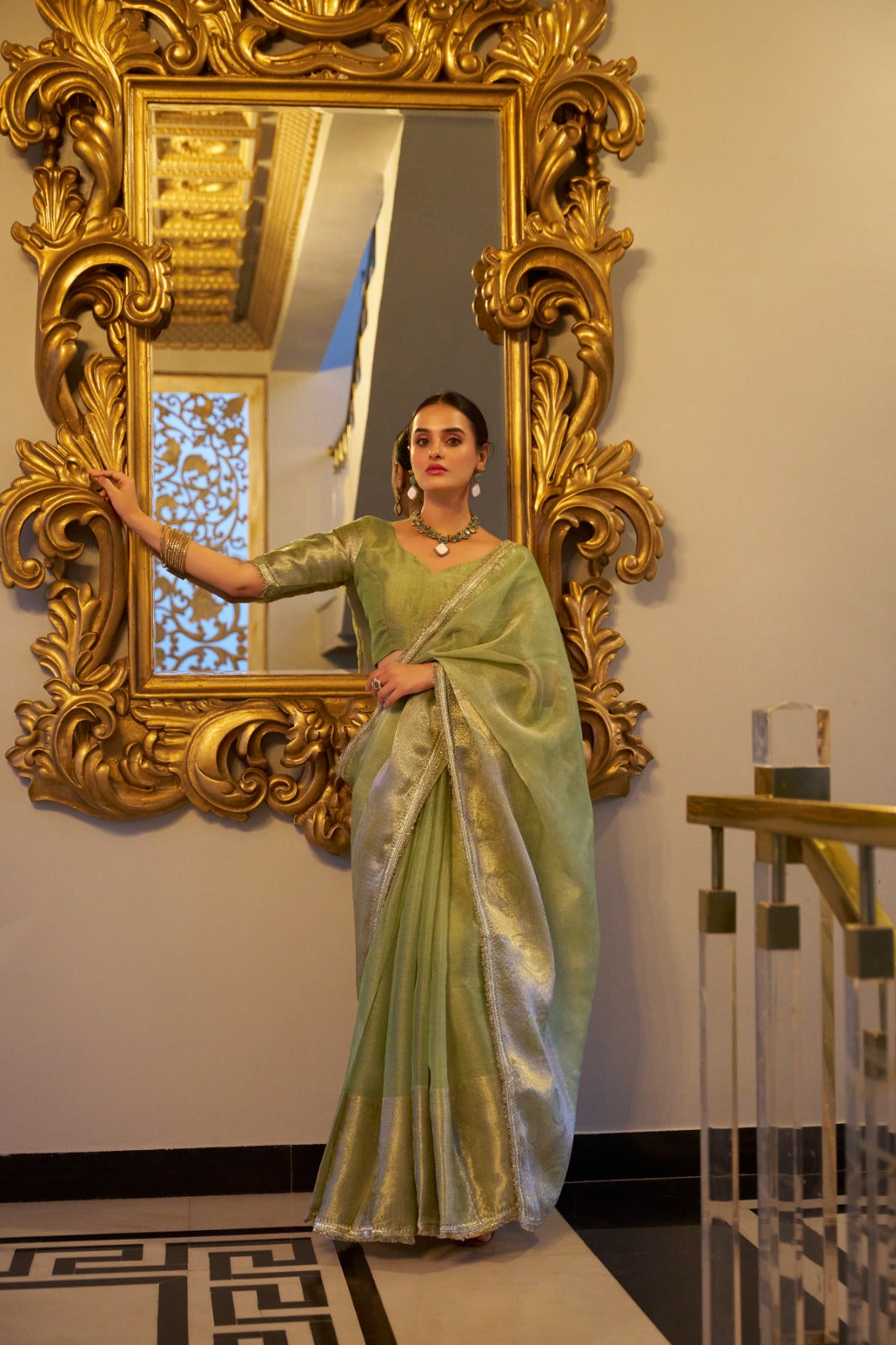 Pista Elegant Tissue Shimmer Saree with Zari Weaving and Sequins Lace Border