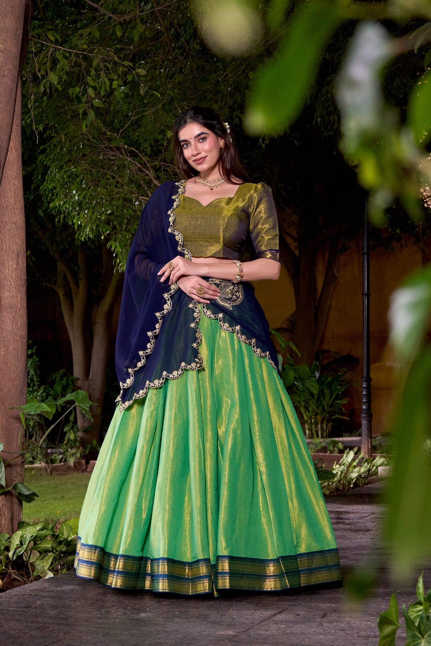 Pista Green Kanchipuram Zari Weaving Lehenga with Navy Blue Embroidered Georgette Dupatta
