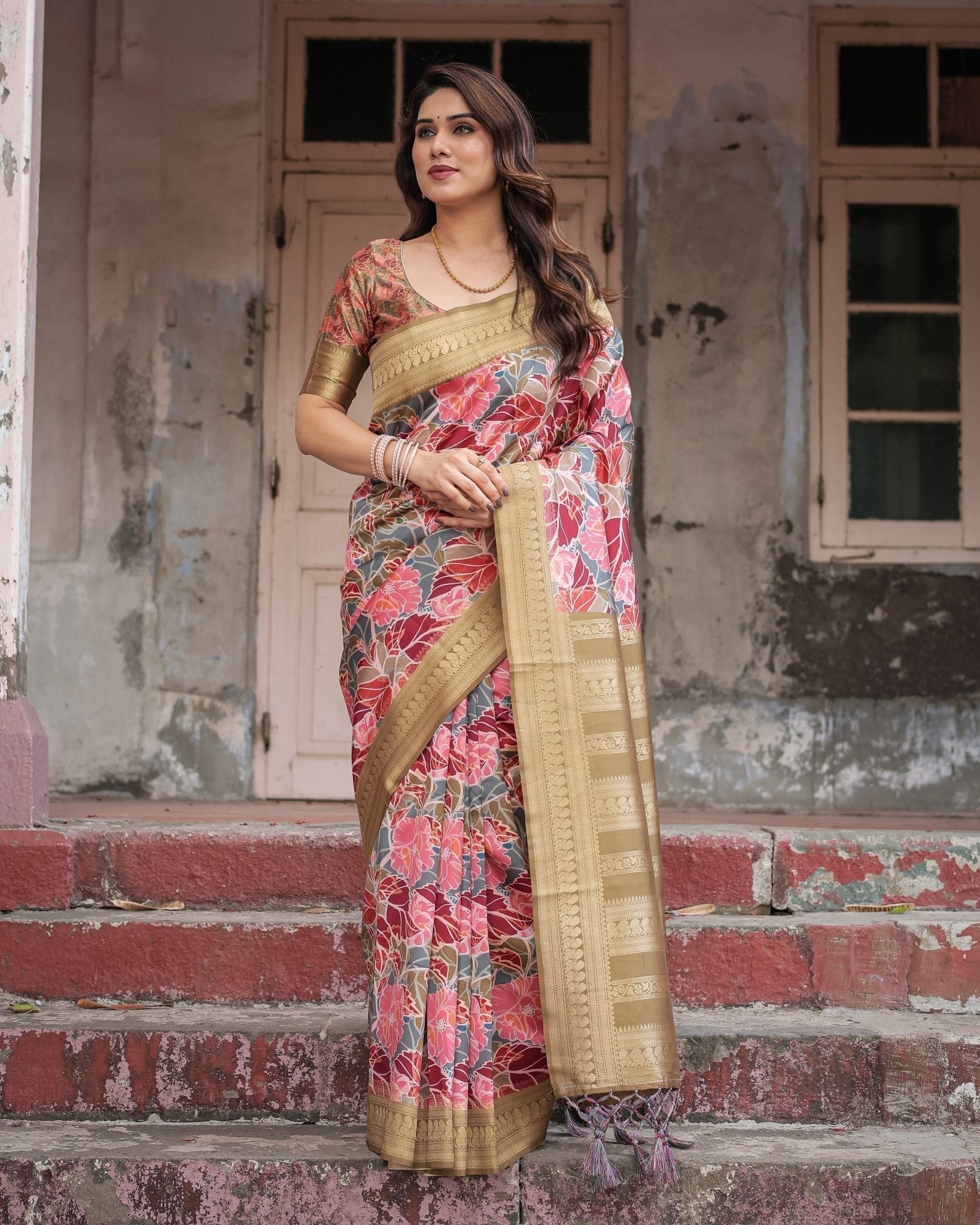 Gold Banarasi Silk Saree with Bold Floral Print and Intricate Zari Border