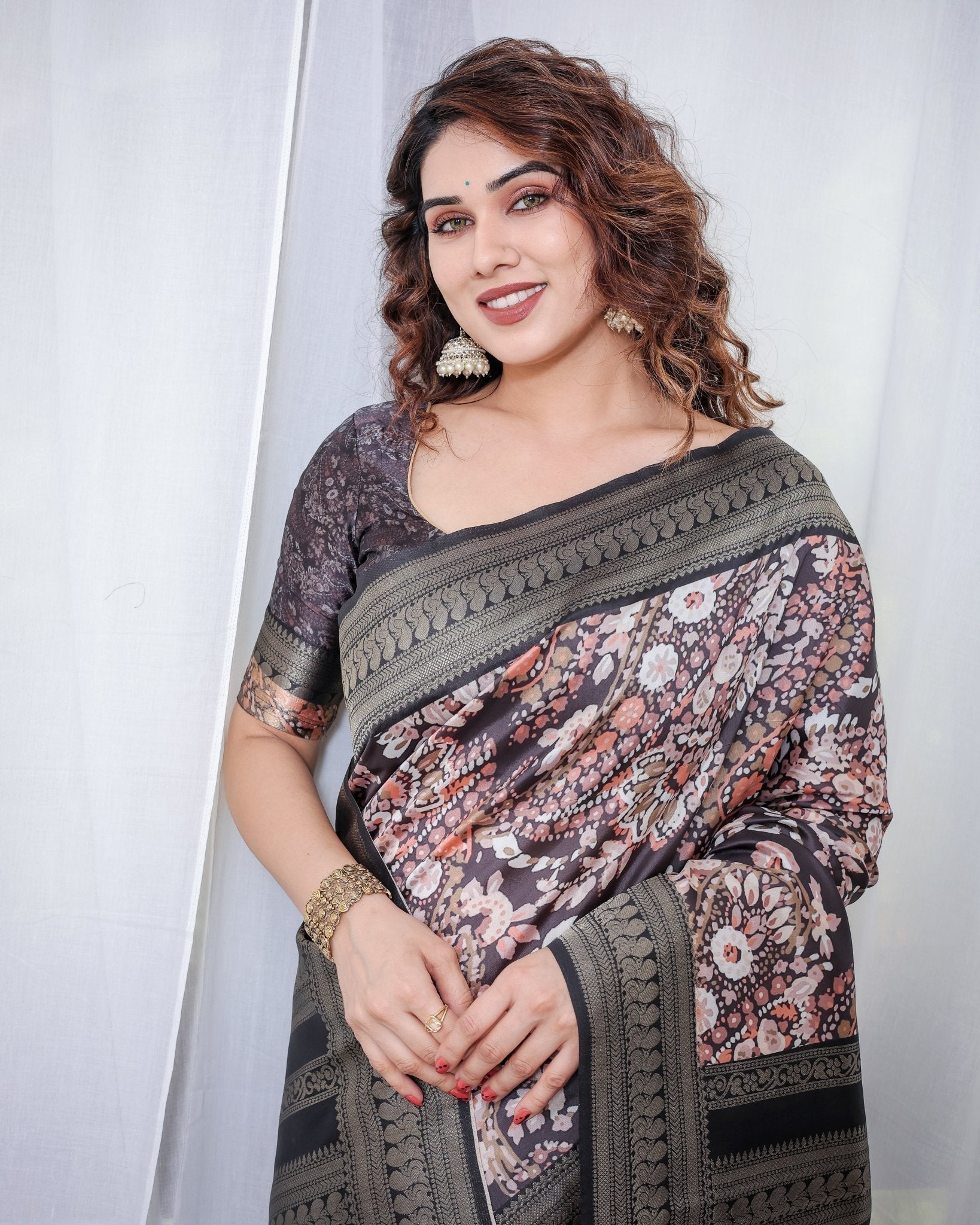 Exquisite Black and Pink Floral Banarasi Silk Saree with Intricate Tassels