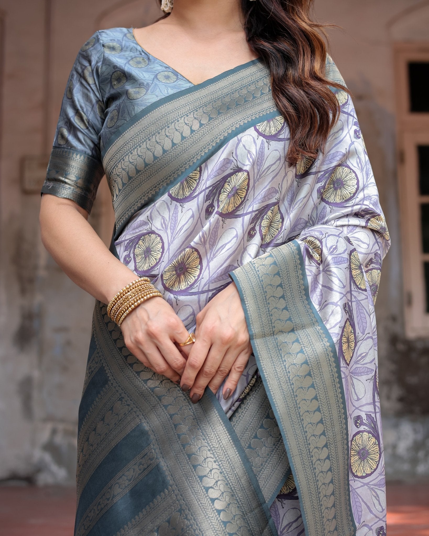 Sophisticated Lilac Banarasi Silk Saree with Floral Prints and Zari Tassel Border