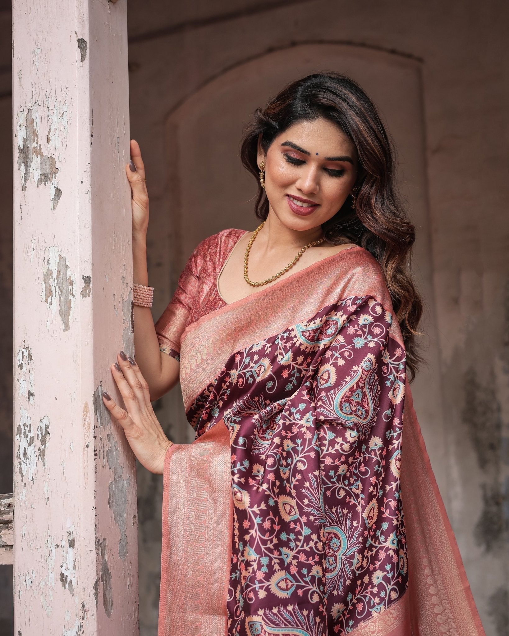 Maroon Banarasi Silk Saree with Peach Zari Border and Paisley Motifs