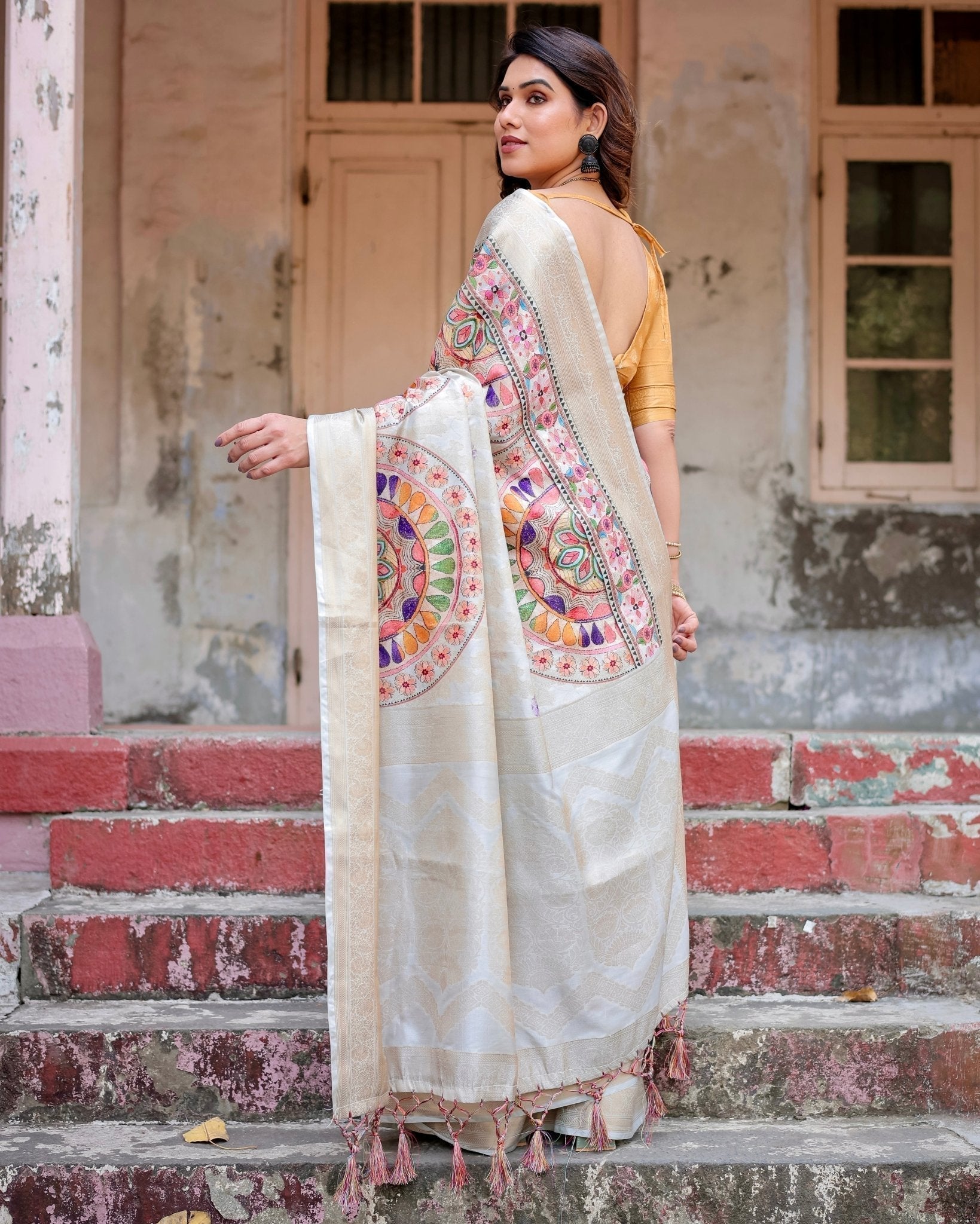 Off-White and Multicolor Mandala Design Banarasi Silk Saree with Zari Weave and Tassel-Adorned Pallu