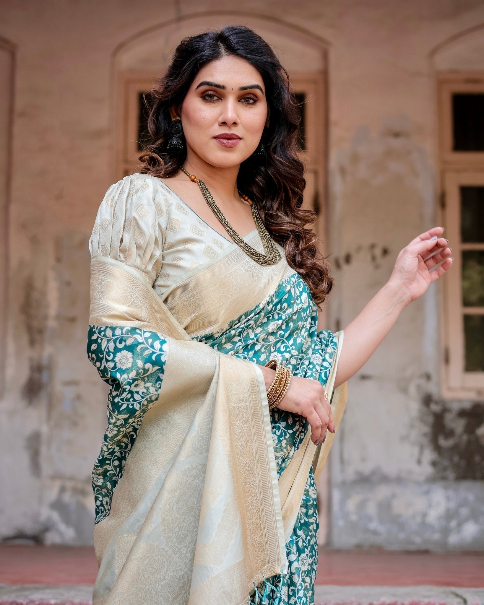 Teal and Cream Floral Banarasi Silk Saree with Zari Weave and Tassel-Accented Pallu