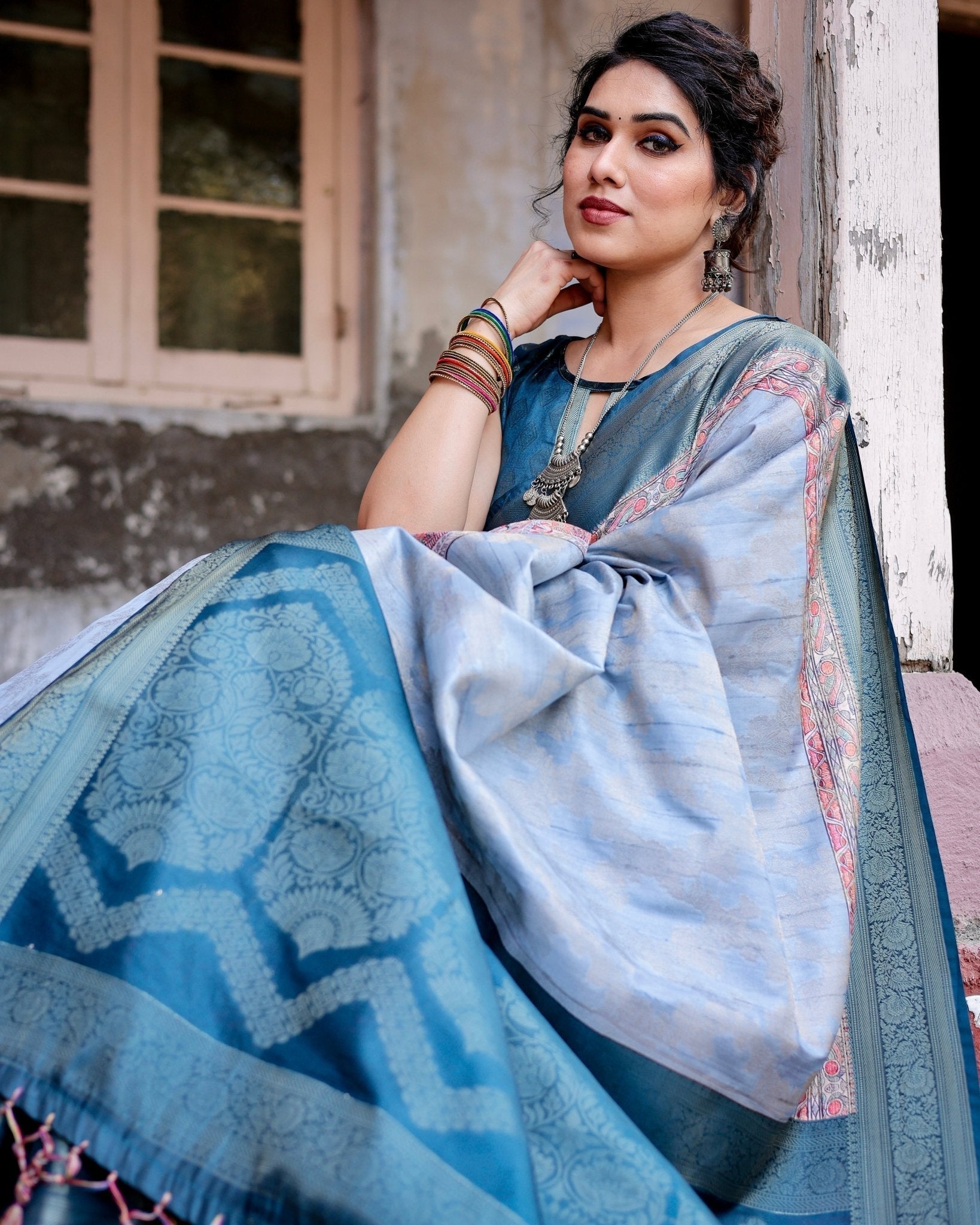 Elegant Blue and Beige Banarasi Silk Saree with Ornate Zari Weaving and Tassels