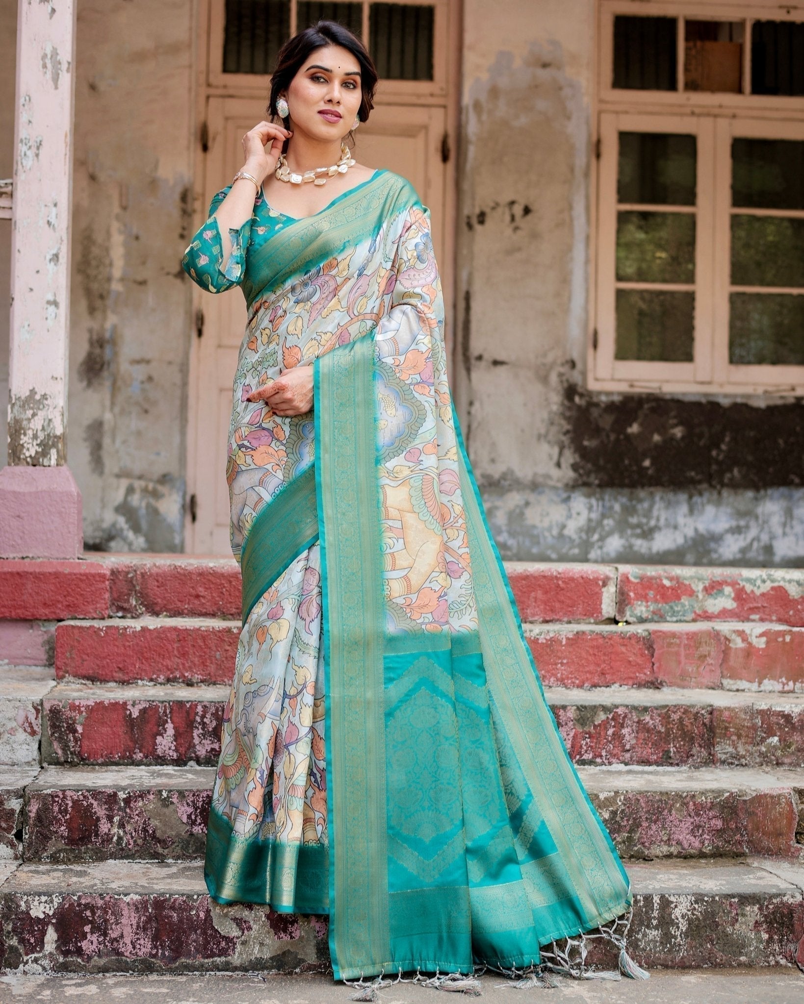Graceful Green Banarasi Silk Saree with Vibrant Motifs and Zari Woven Pallu