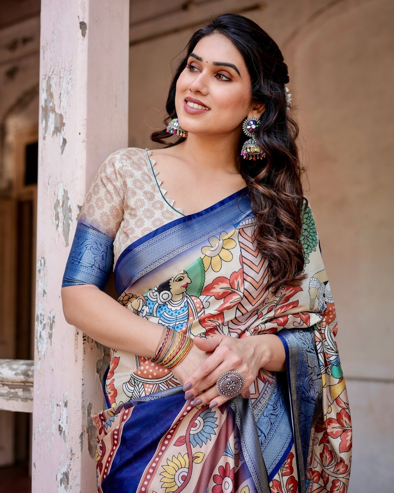 Multicolor Tussar Silk Saree with Artistic Floral Motifs and Traditional Blue Zari Border