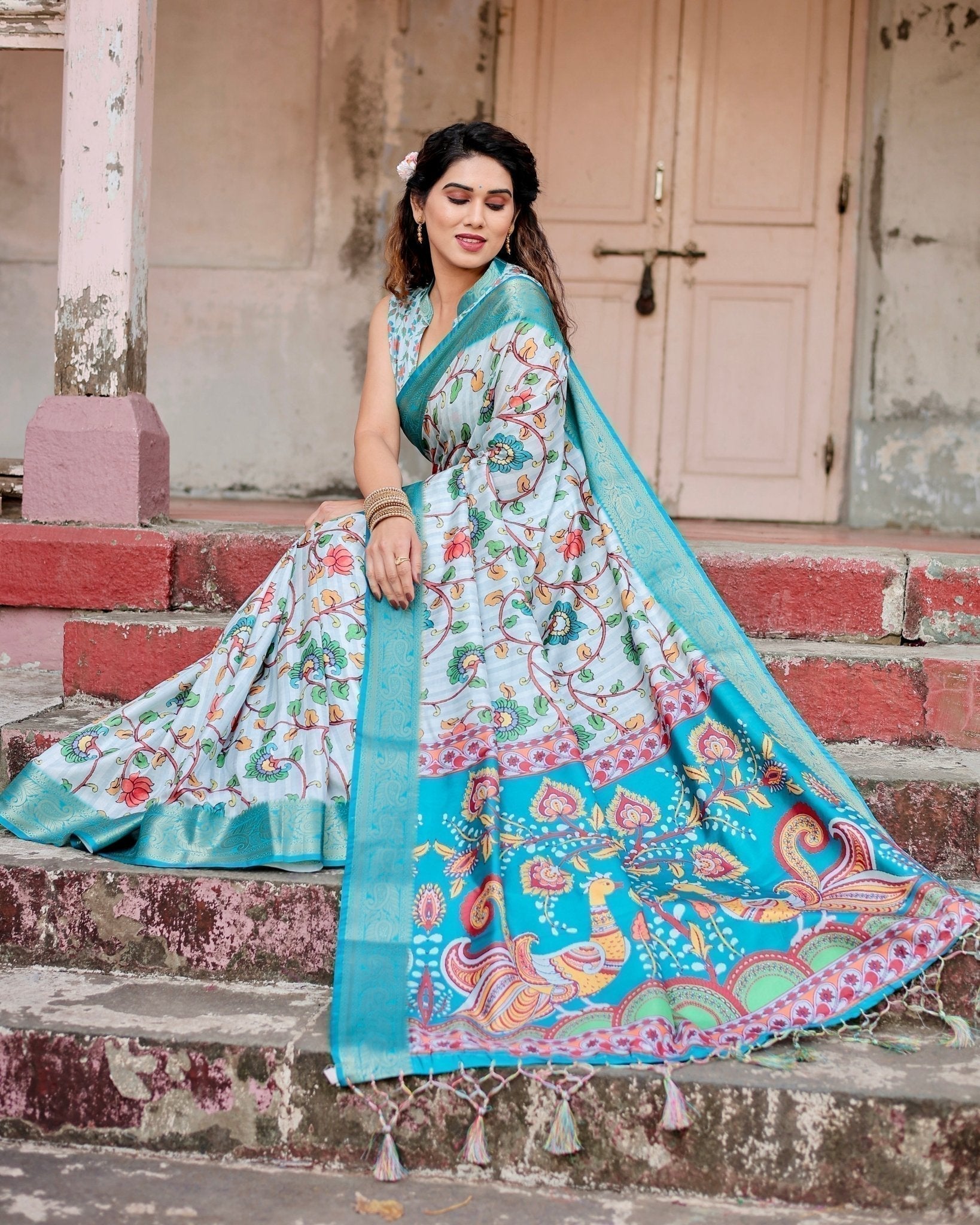 Sky Blue Tussar Silk Saree with Multicolor Floral Design and Zari Paisley Border